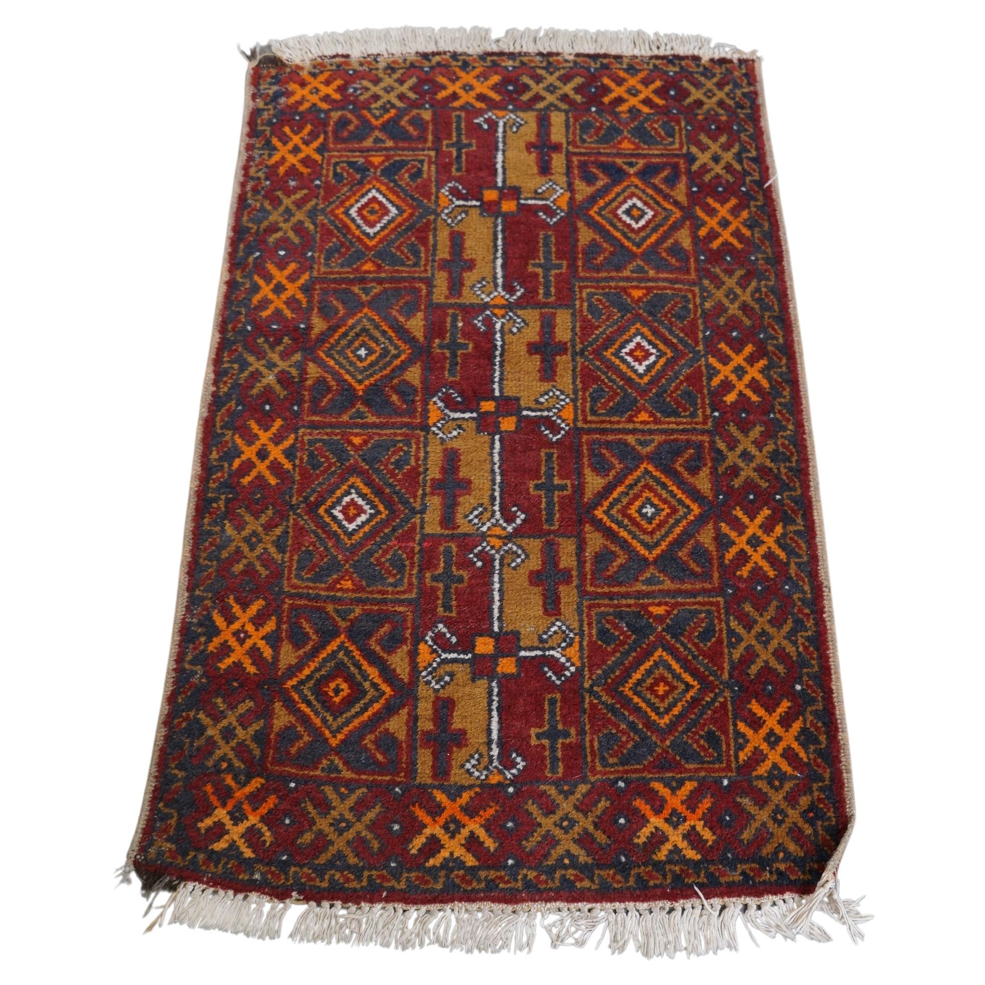 Unique and old oriental rug with great colors and orange details 135x81cm