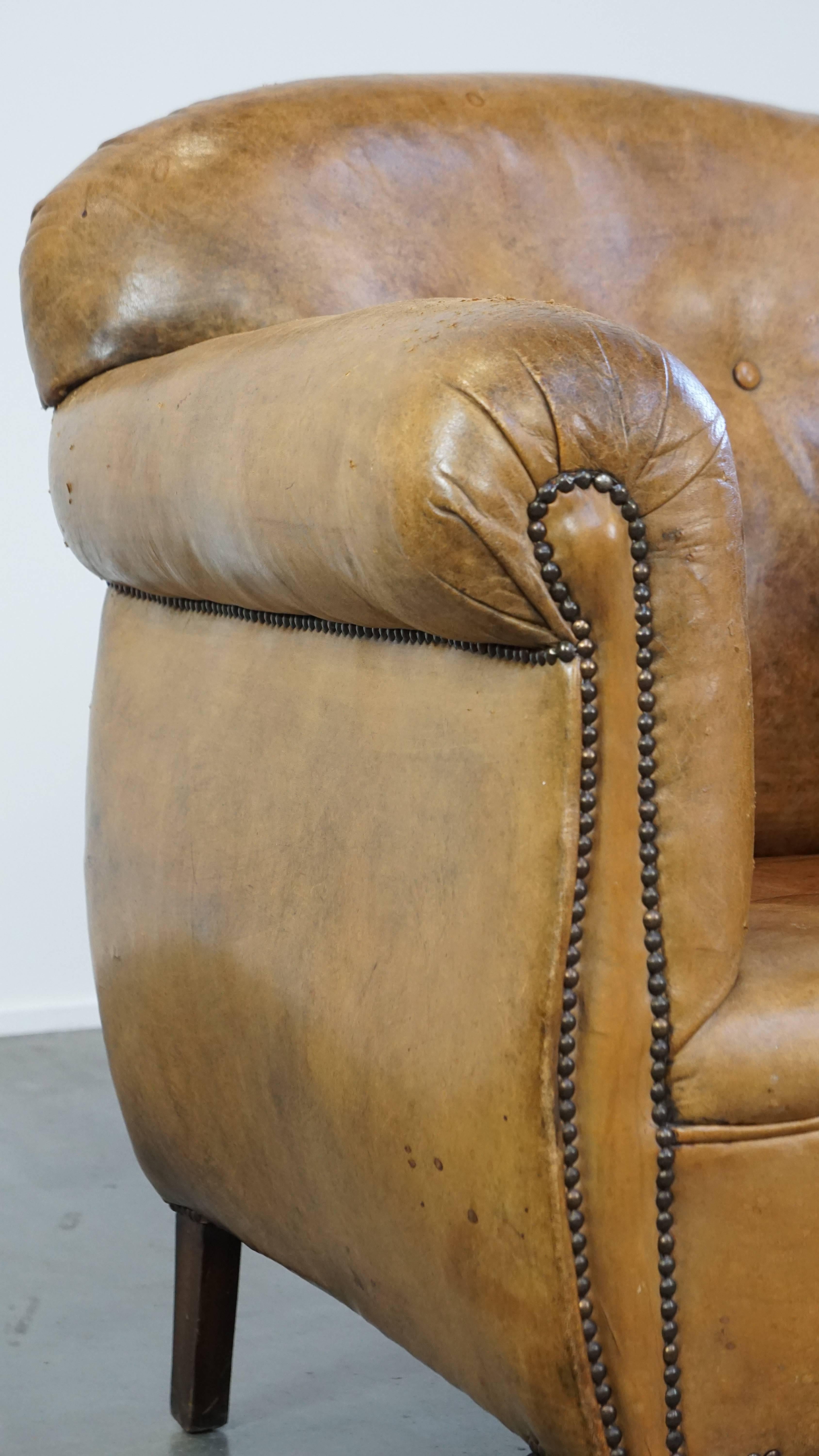 Unique antique armchair made of sheepskin with beautiful, elegant legs For Sale 7