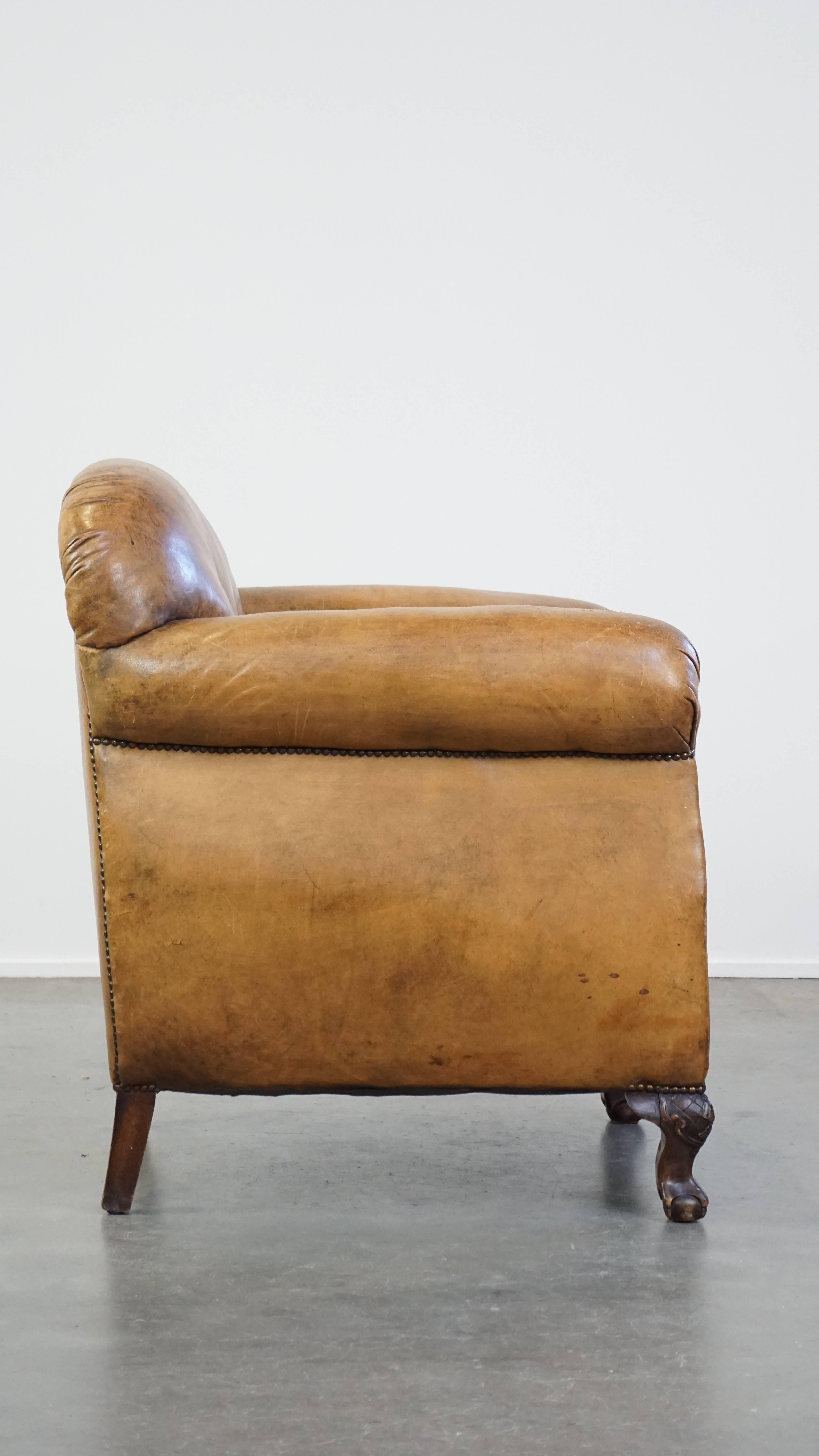 Hand-Crafted Unique antique armchair made of sheepskin with beautiful, elegant legs For Sale