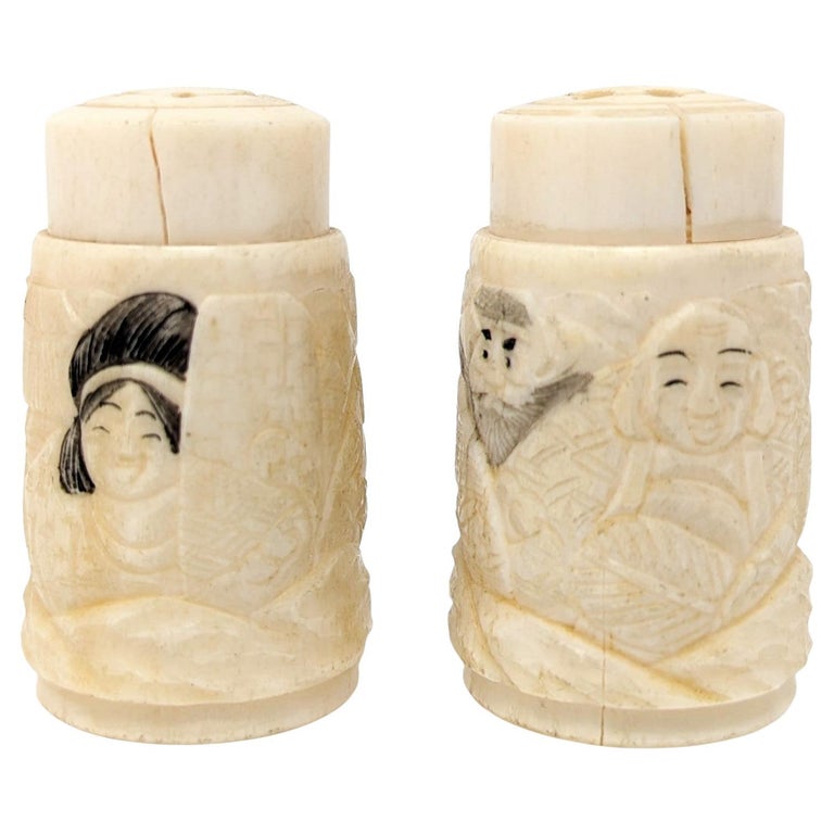 https://a.1stdibscdn.com/unique-antique-asian-hand-carved-bone-salt-and-pepper-shakers-set-for-sale/f_80442/f_350334621688140112136/f_35033462_1688140112707_bg_processed.jpg?width=768