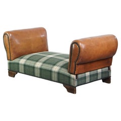 Unique antique daybed reupholstered with sheepskin and Scottish tartan wool