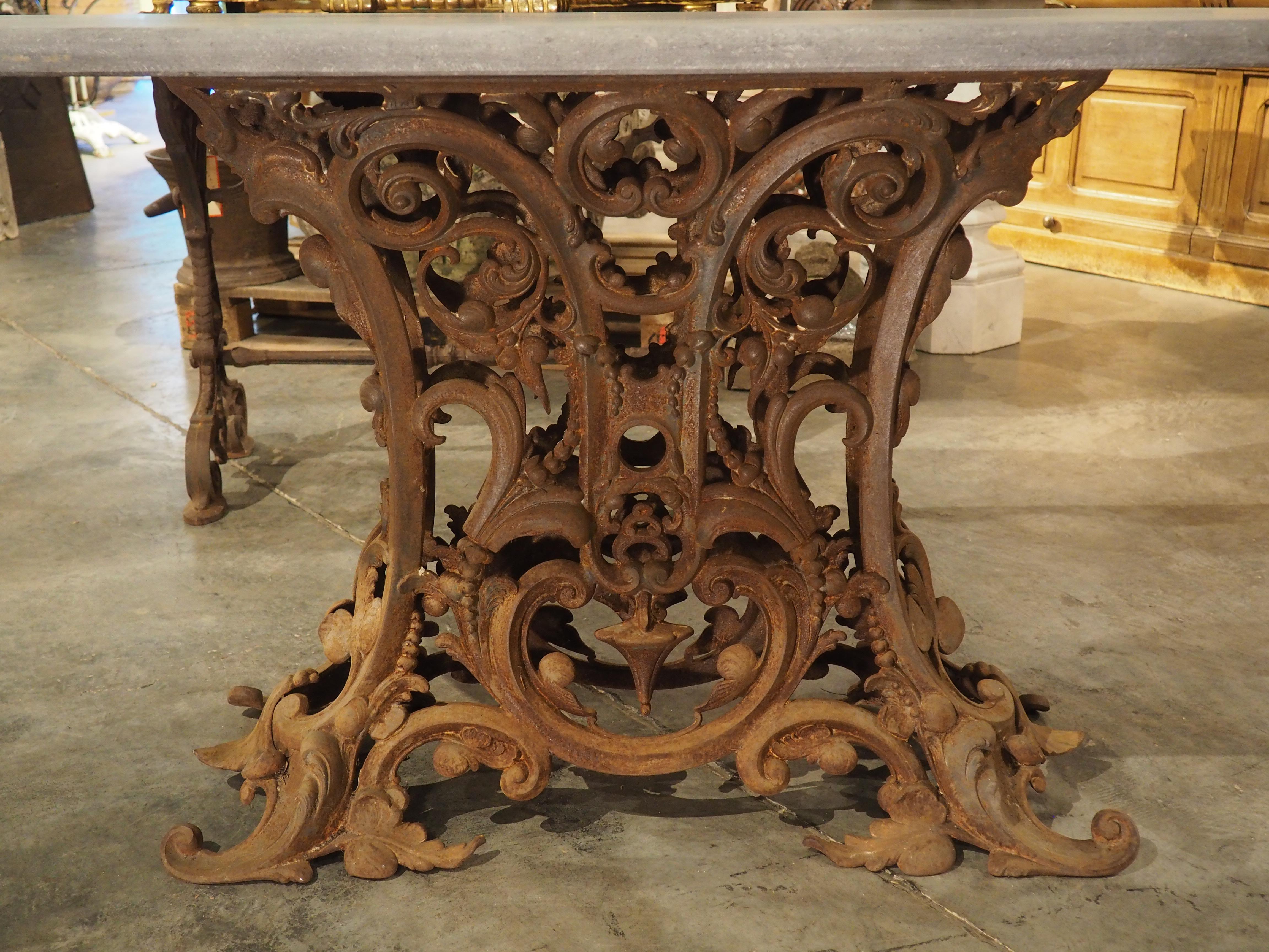 Metal Unique Antique French Cast Iron Table with Oval Bluestone Top, Circa 1900