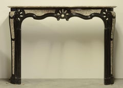 Cheminée Louis XIV unique en marbre ancien