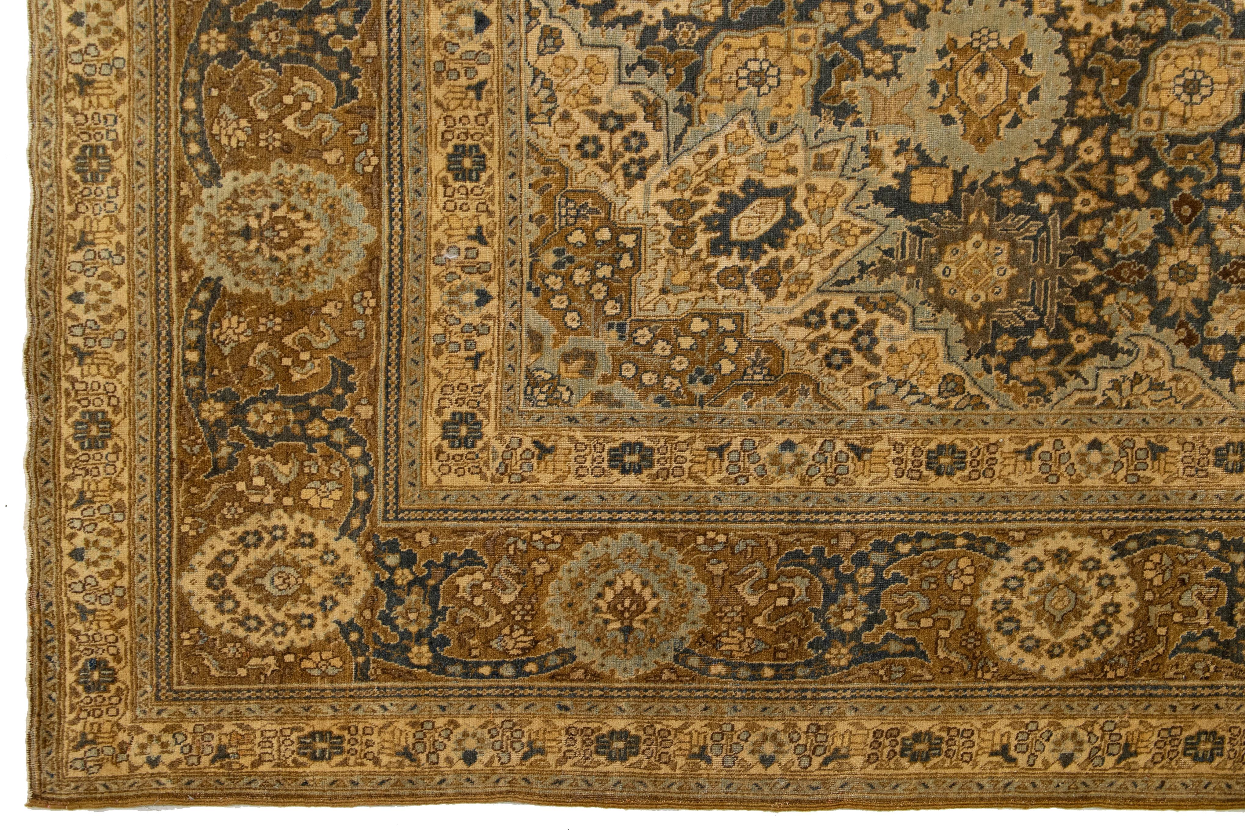 Lana Unico tappeto antico persiano in lana Tabriz blu navy con disegni floreali in vendita