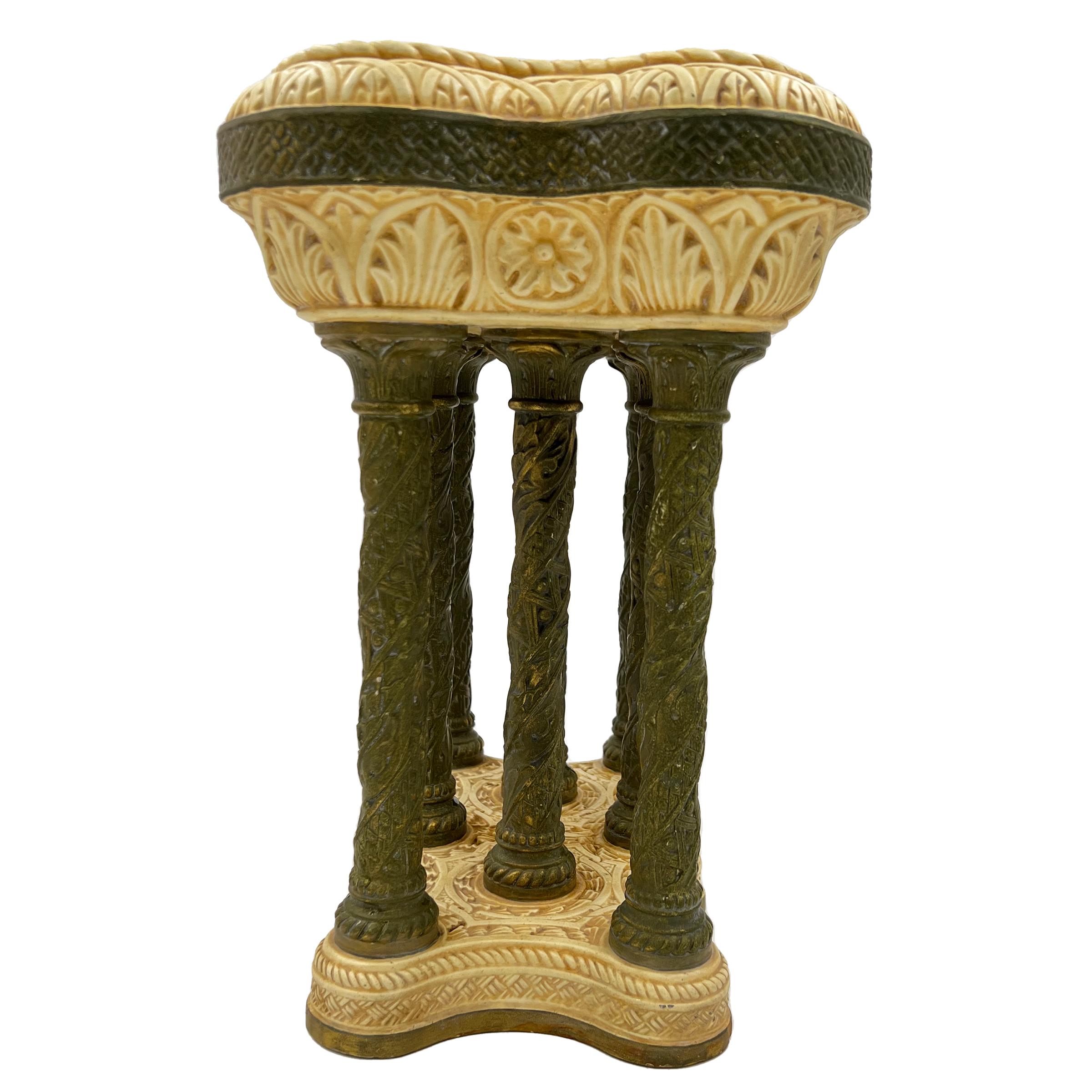 Fine and unique porcelain jardiniere raised on eight columns, Late 19th century - Early 20th century.