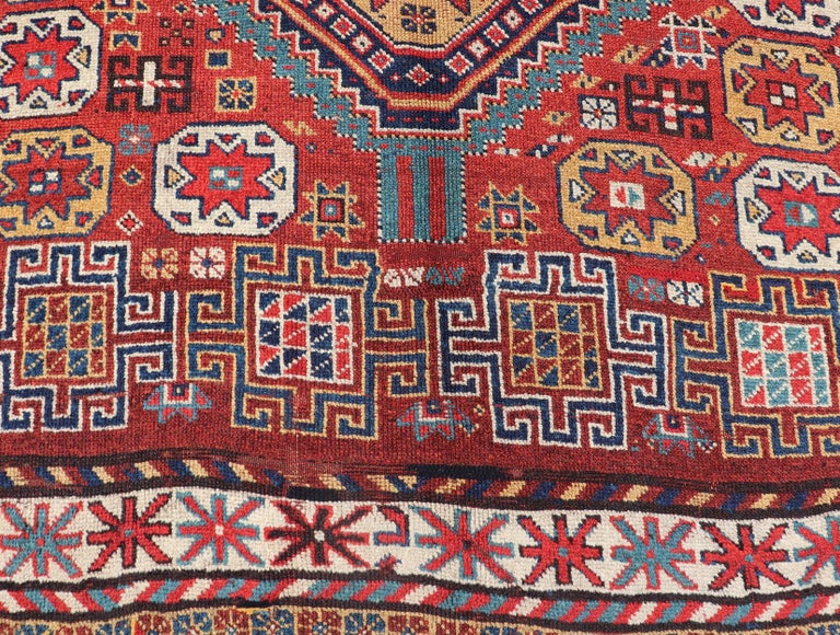Unique Antique Qashqai Rug with Geometric Motifs in Red, Blue, and Golden Yellow For Sale 4