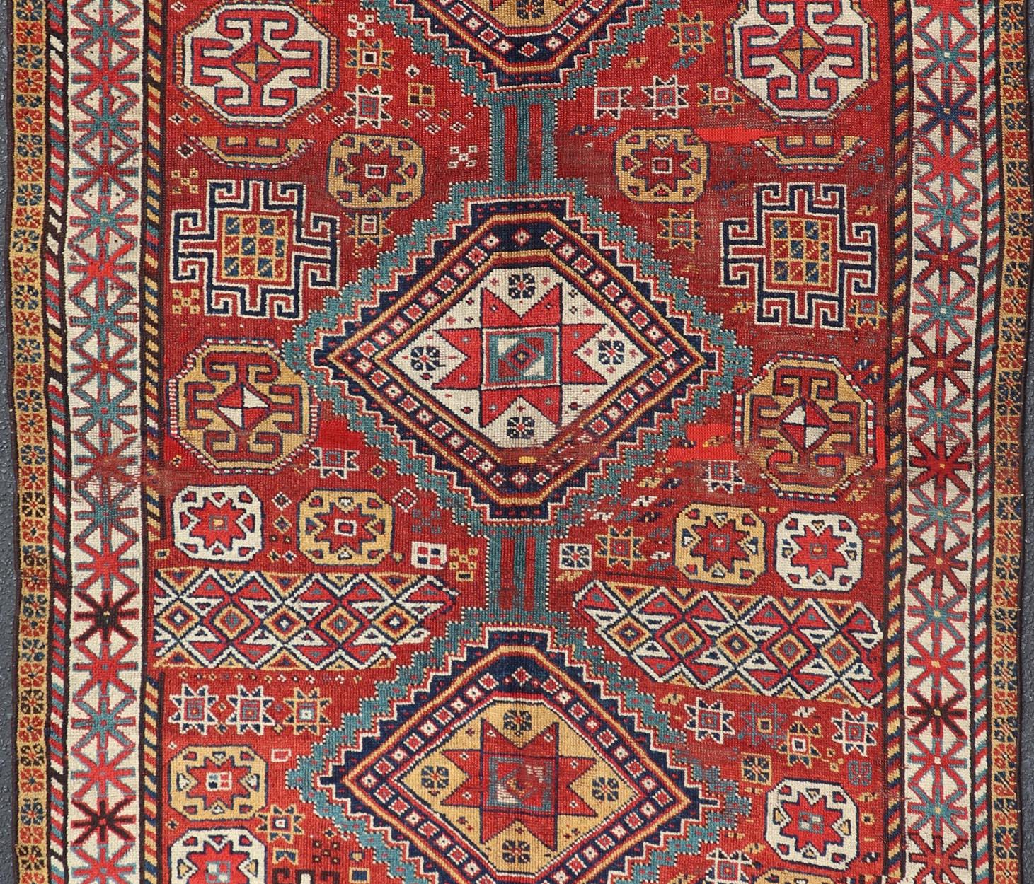 Kazak Unique Antique Qashqai Rug with Geometric Motifs in Red, Blue, and Golden Yellow For Sale