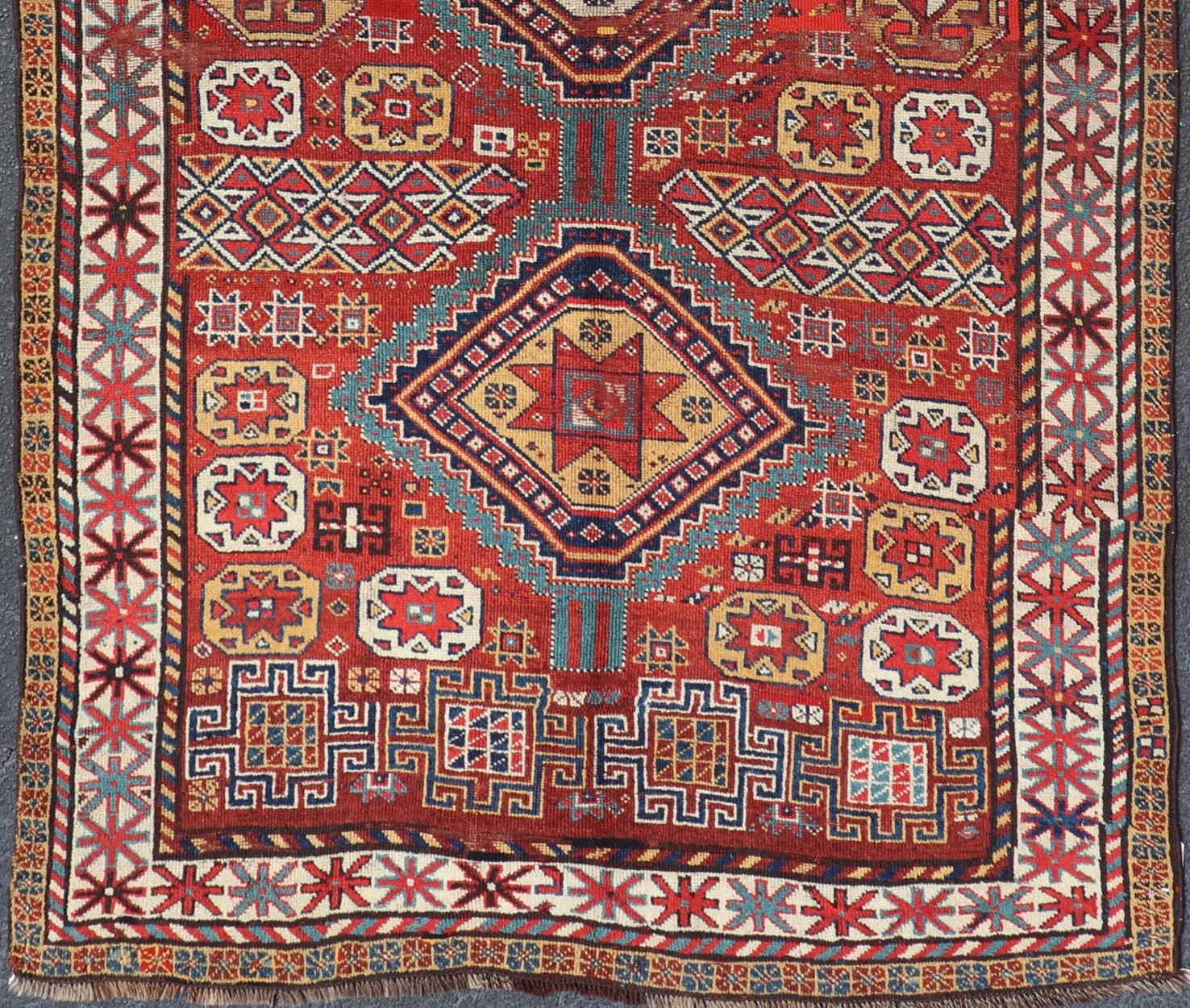 Caucasian Unique Antique Qashqai Rug with Geometric Motifs in Red, Blue, and Golden Yellow For Sale