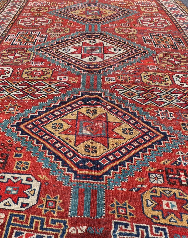 Late 19th Century Unique Antique Qashqai Rug with Geometric Motifs in Red, Blue, and Golden Yellow For Sale