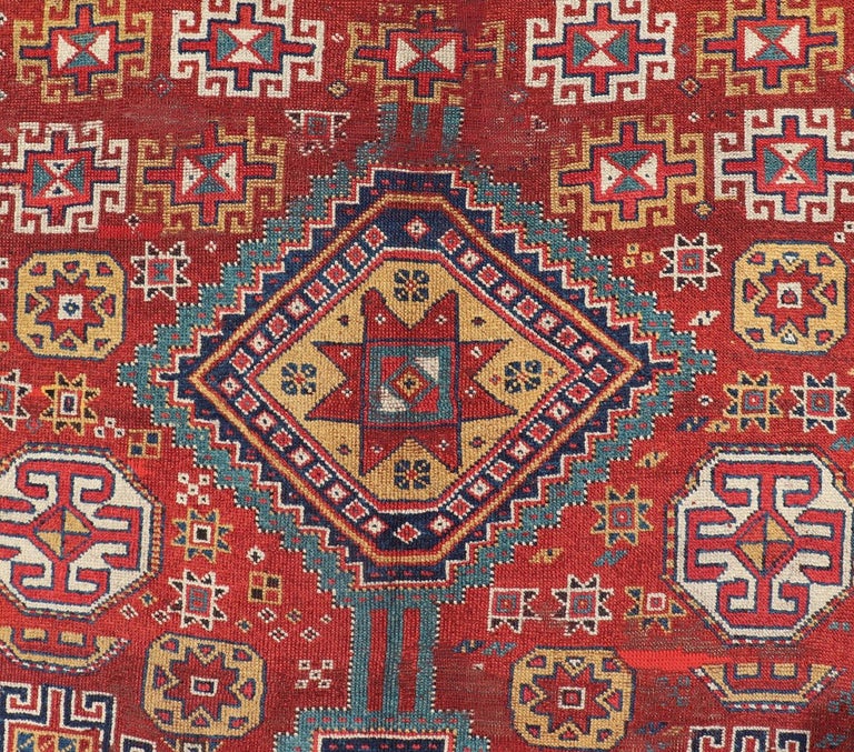 Unique Antique Qashqai Rug with Geometric Motifs in Red, Blue, and Golden Yellow For Sale 1