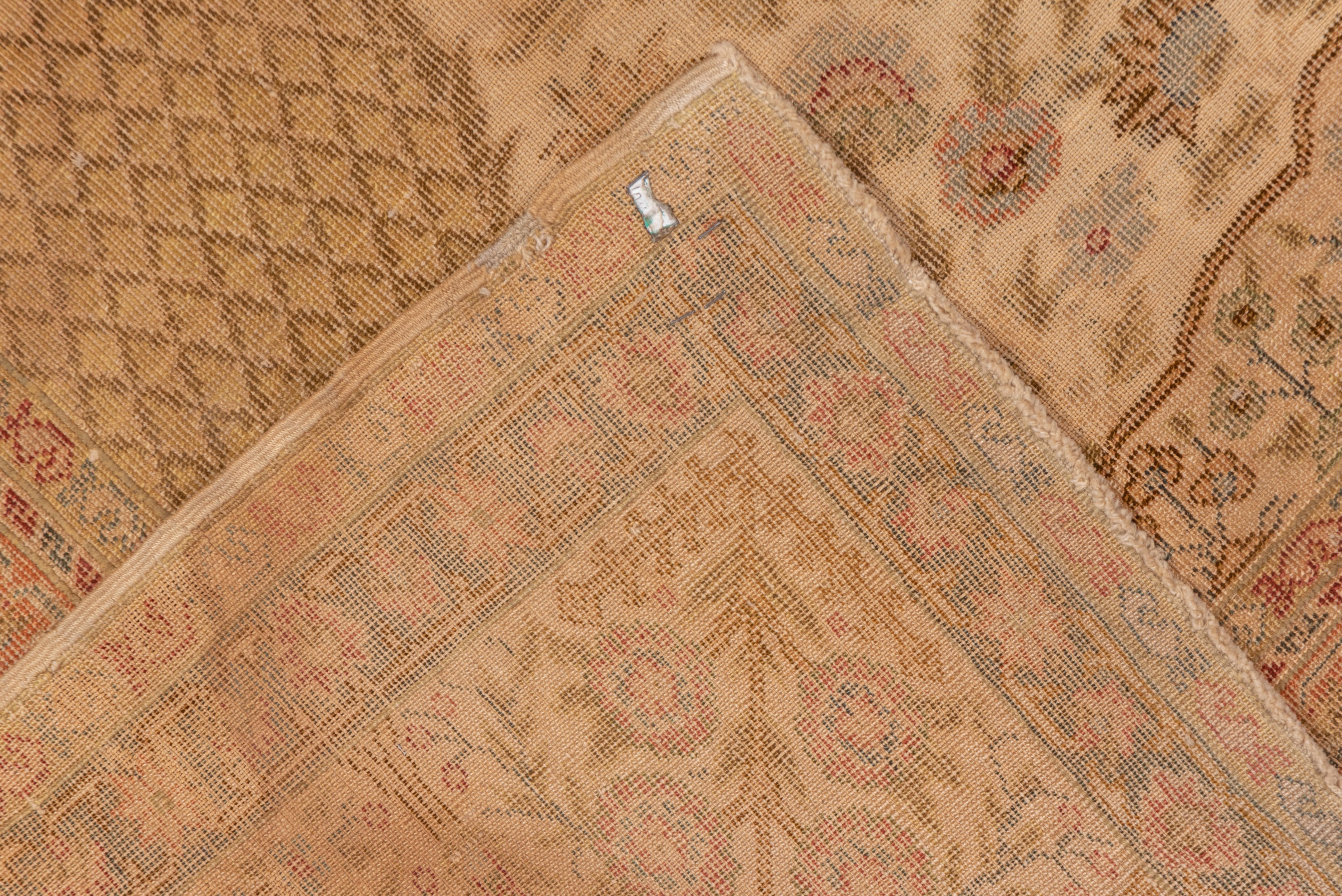 A basically tone-on-tone study in brown tones on this antique very finely woven Kashir pile prayer rugs with half cypress trees on the sides of a millefleurs field. Skinny cypresses and five posy flowers alternate in the border. Creamy sand field,