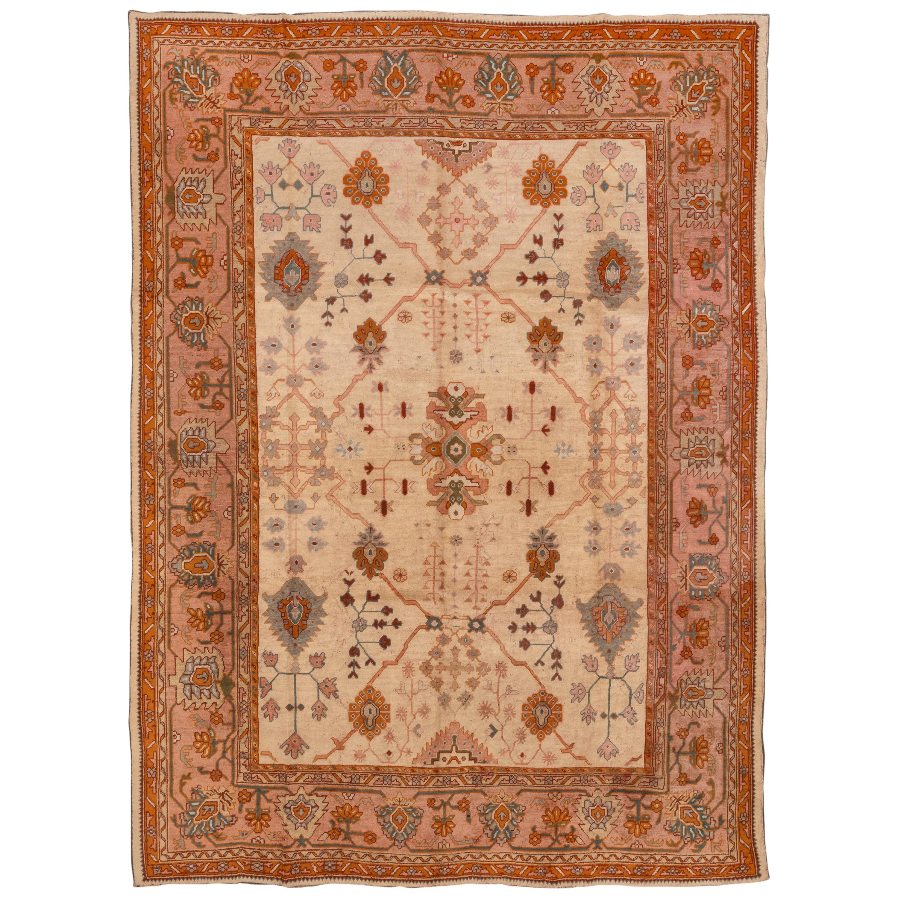 Tribal Antique Turkish Oushak Rug, Cream Allover Field, Pink and Orange Borders For Sale