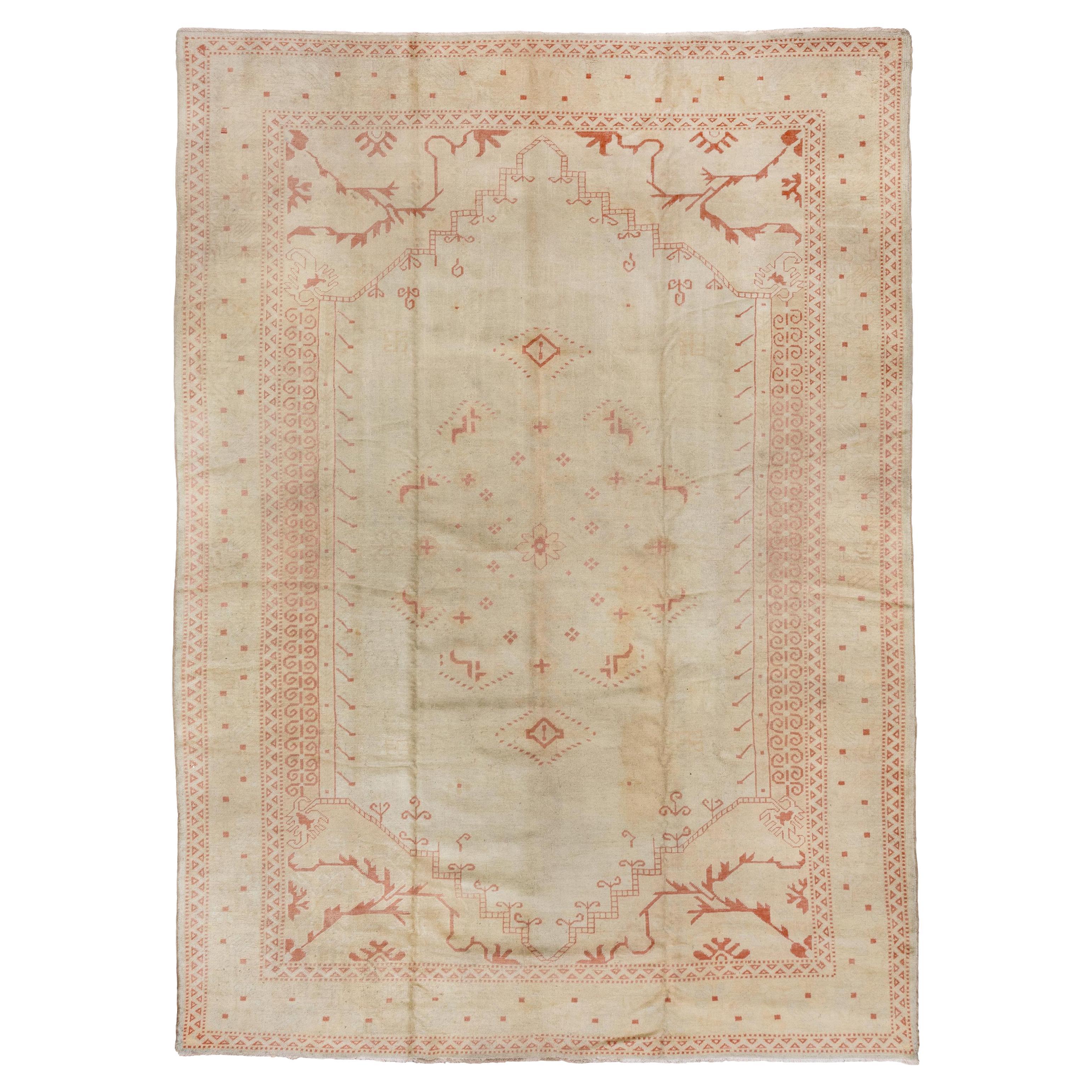 Unique Antique Turkish Oushak Rug, Neutral Field, Coral Accents, circa 1910s For Sale