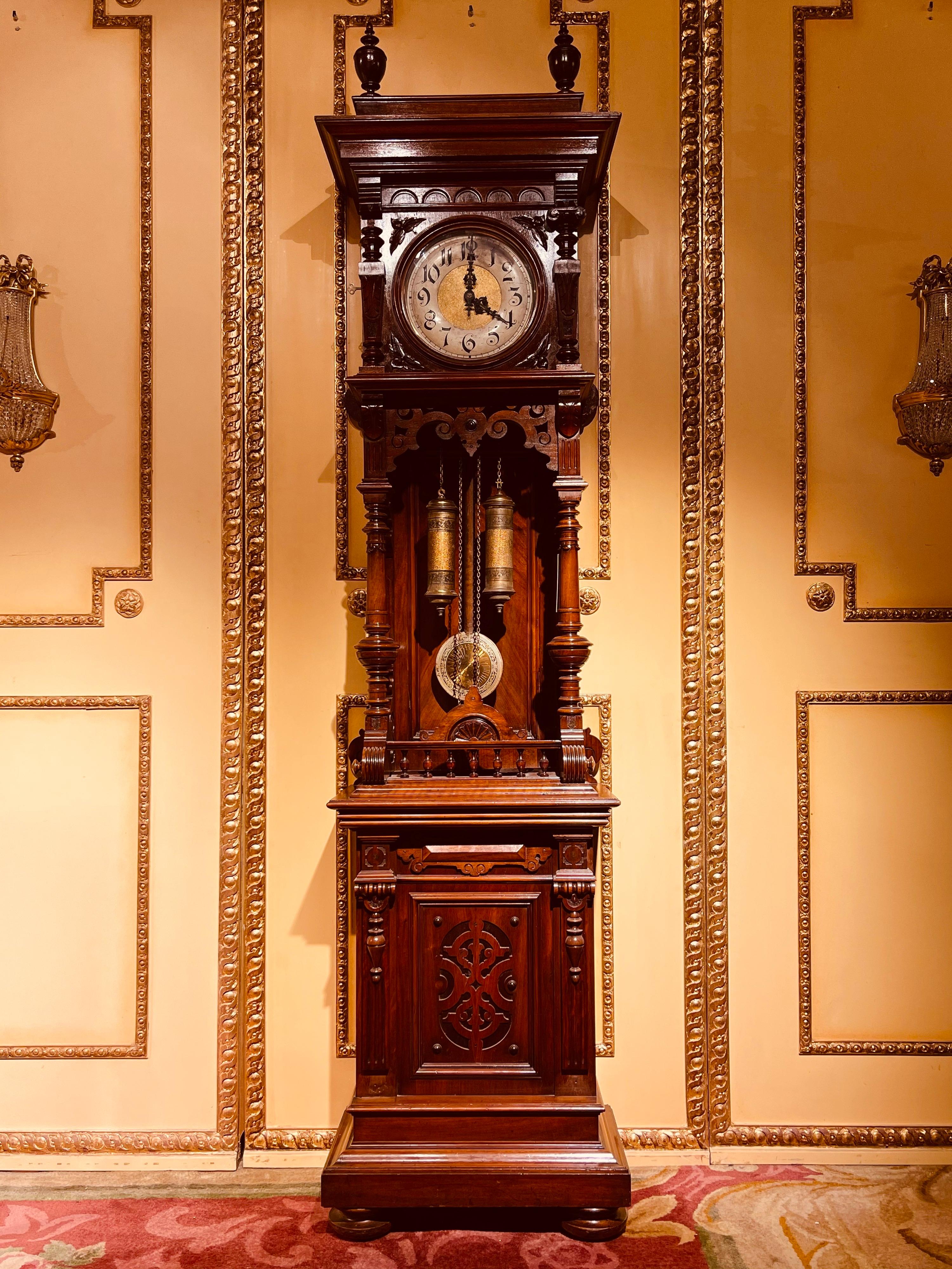 Unique antique Wilhelminian style grandfather clock, walnut, 19th century.

German grandfather clock from the 19th second hand and hour strike on bell with two weights and pendulum. Fully functional. Extremely finely carved walnut body with many