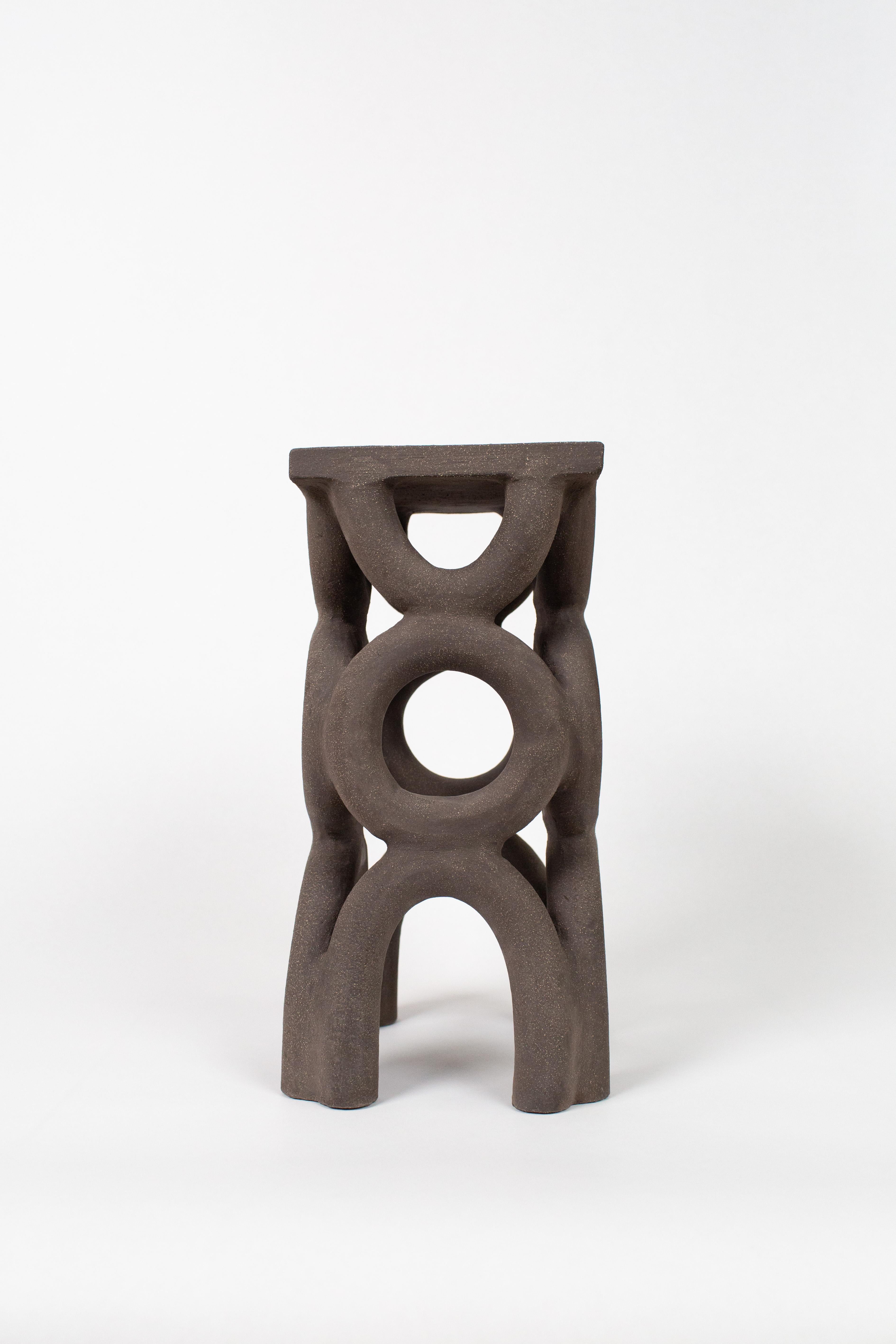 Unique arch square dark stool by Mesut Öztürk.
Dimensions:  W 19 x D 19 x  H 40 cm.
Materials: stoneware.

