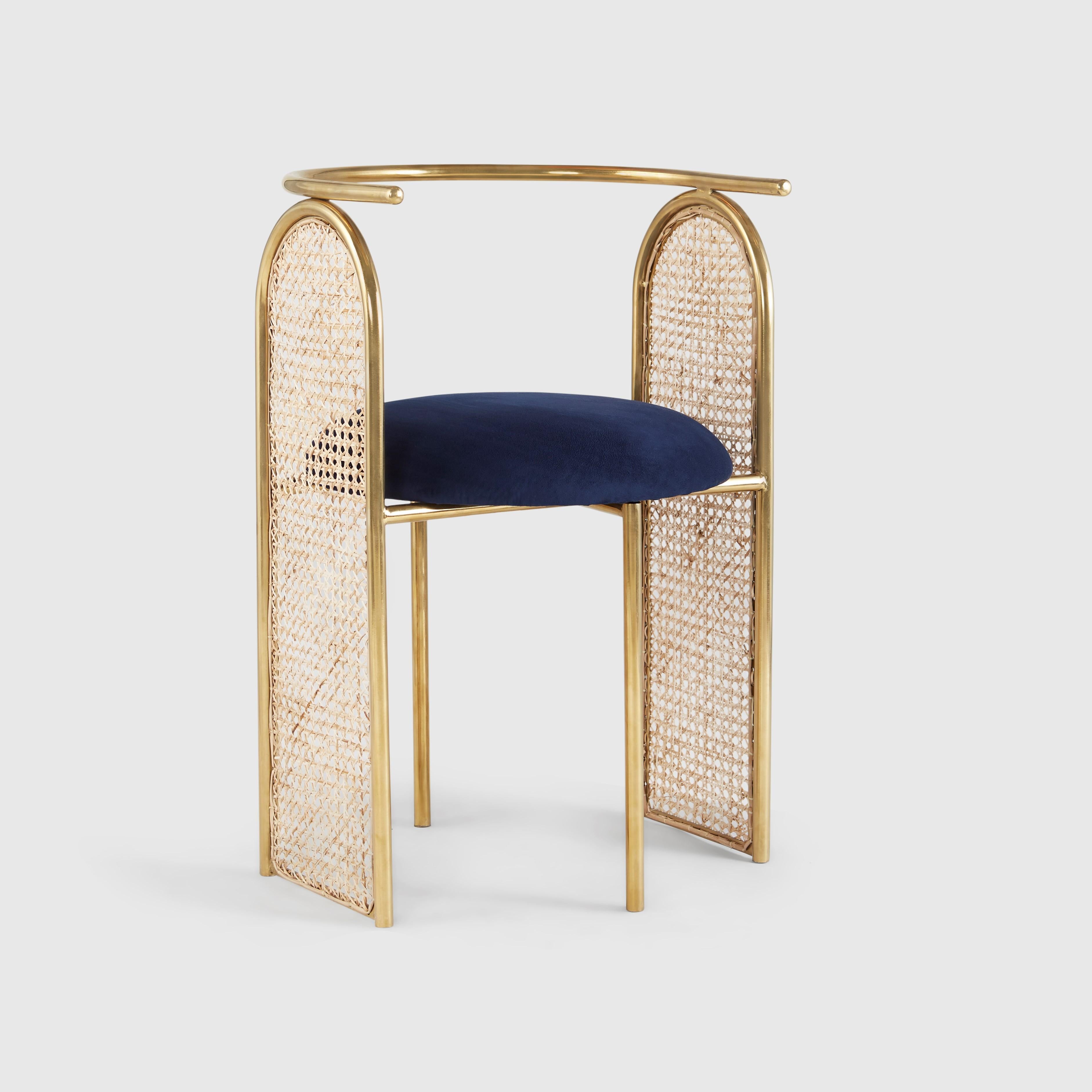 Unique Arco chair gold by Hatsu
Dimensions: D 48 x W 48 x H 74 cm 
Materials: Uphostered seating on powdercoated steel frame

Hatsu is a design studio based in Mumbai that creates modern lighting that are unique and immediately recognisable. We
