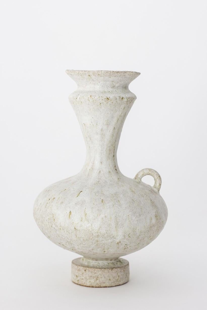 Unique Arq 006 Vase by Raquel Vidal and Pedro Paz
Dimensions: Ø 15 x 23 cm
Materials: hand-sculpted, glazed pottery

The pieces are hand built white stoneware with grog, and brushed with experimental glazes mix and textured surface, resulting in