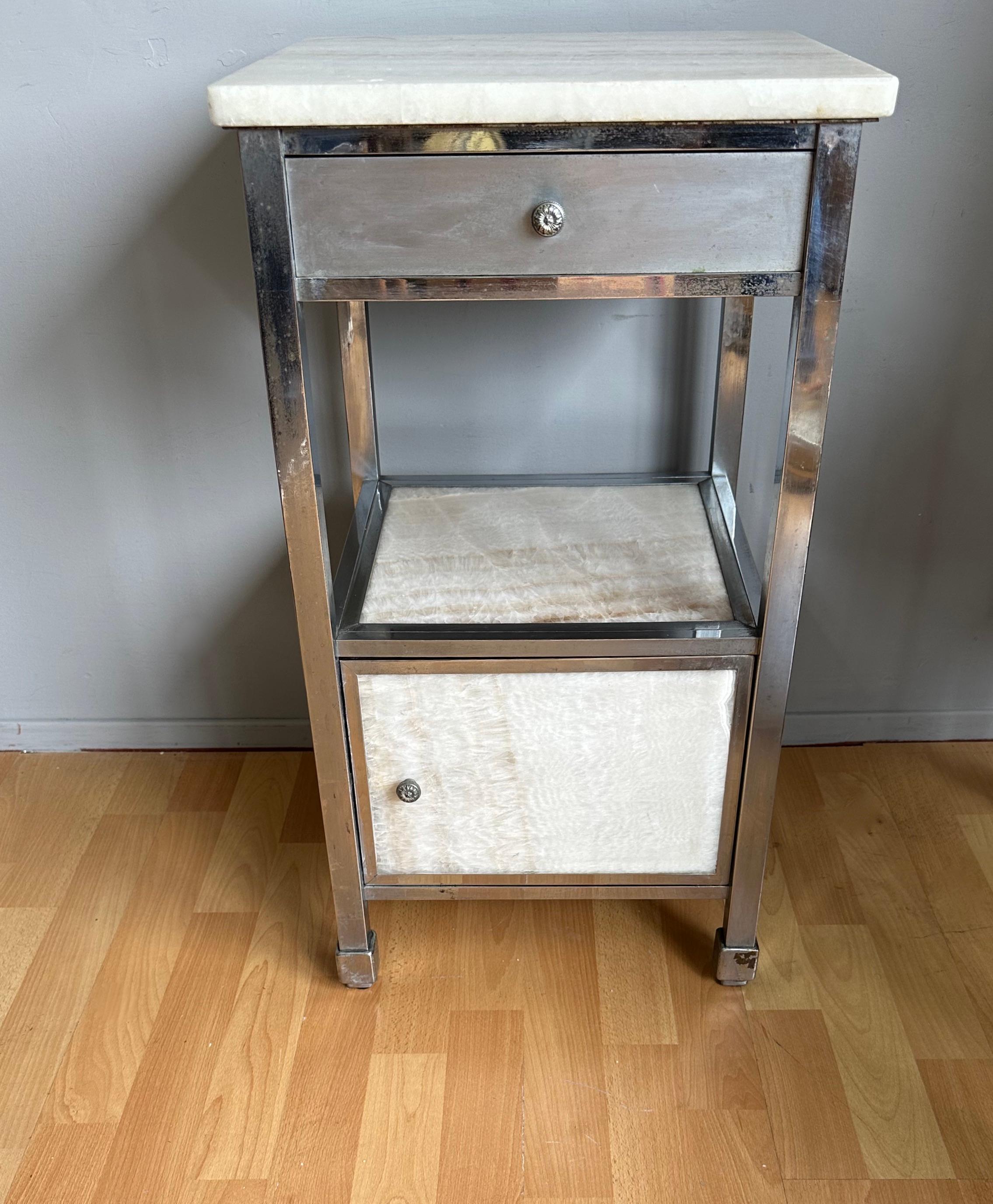 Very rare industrial Art Deco cabinet with onyx marble panels and top.

If you are looking for unique and beautifully handcrafted pieces to decorate your home or business then this Art Deco era cabinet could be yours to own and enjoy soon. This