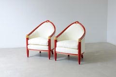 Unique Art Decò pair of lacquered and gilded wood tub chairs