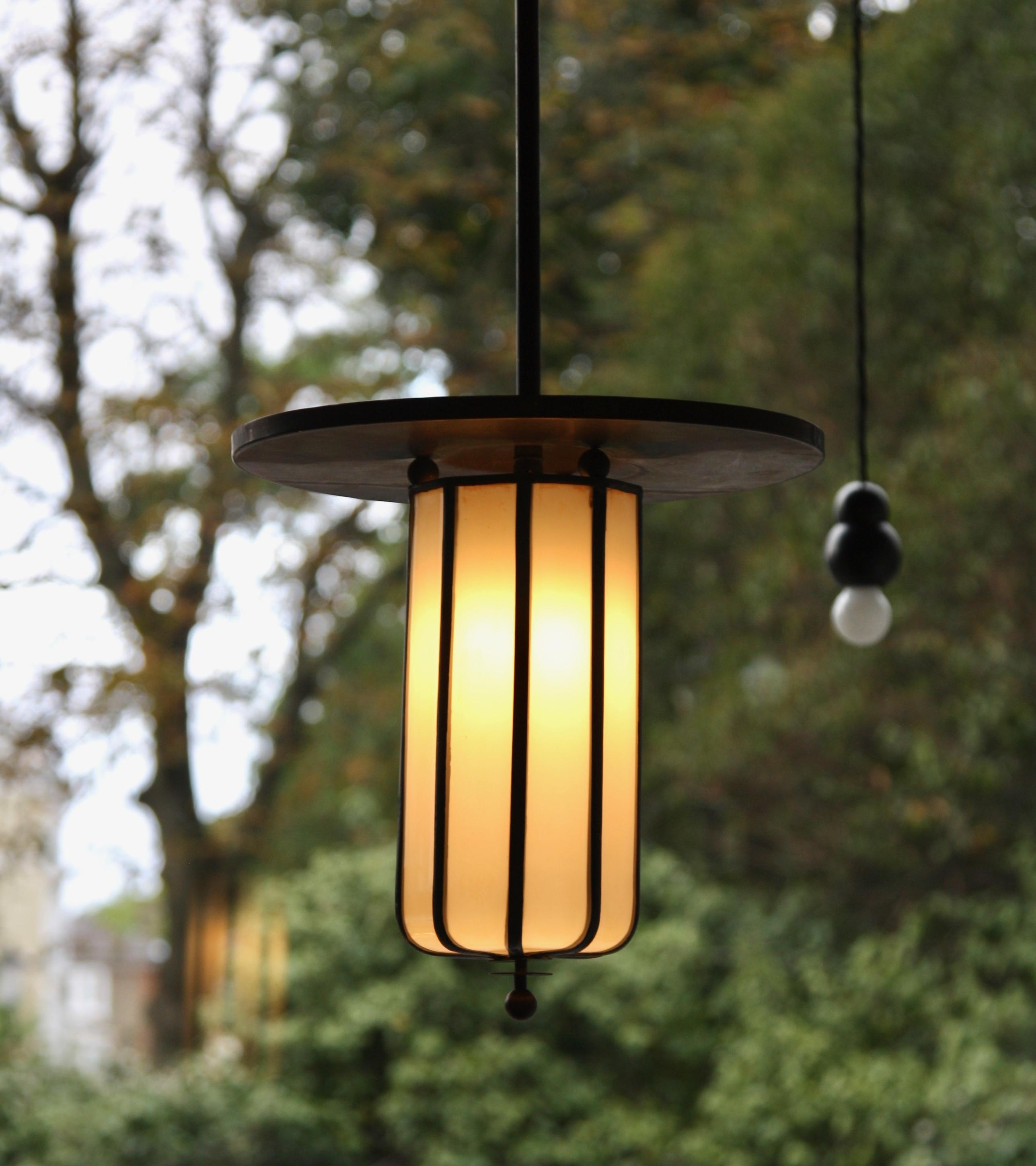 A unique metal and glass pendant light designed and made in the Netherlands, circa 1925.
The lamp was bespoke made for an entrance hallway in Amsterdam hence the elongated proportions of the design.
Furniture that is fitted within an interior