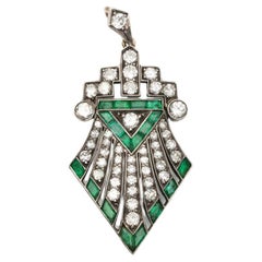 Unique Art Deco pendant with diamonds and emeralds, 1920s/1930s.