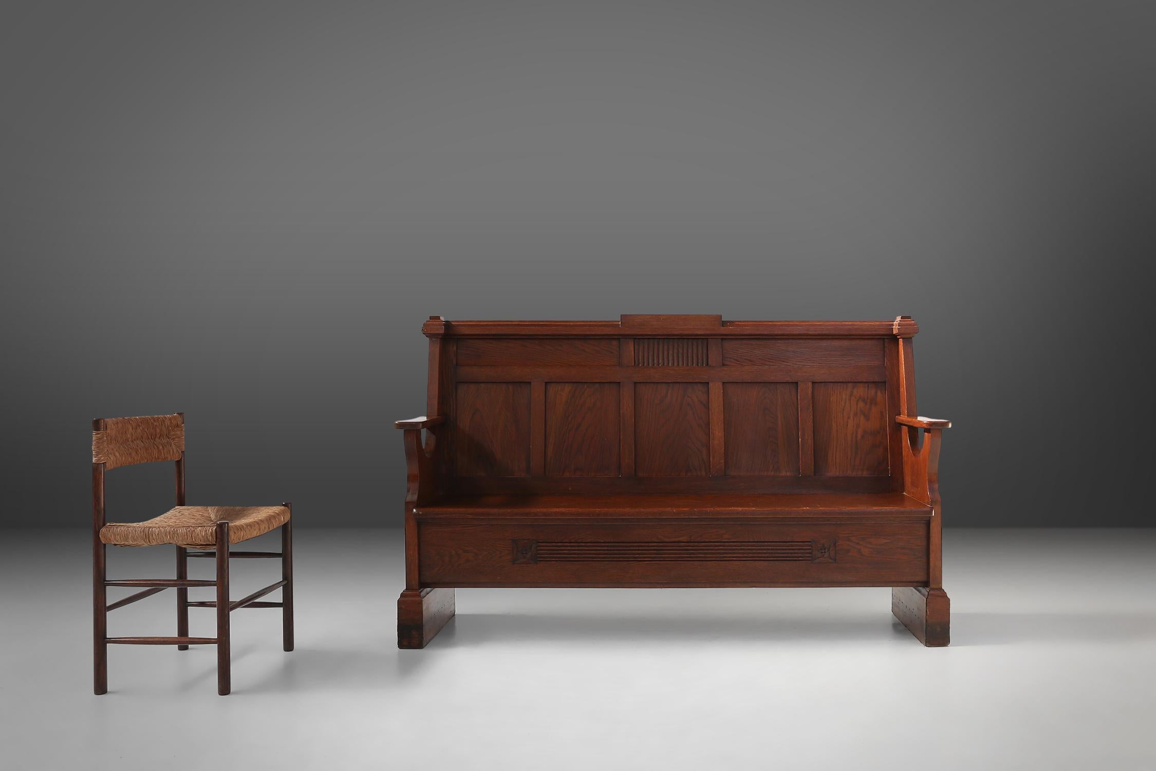France / 1930s / bench / oak / Art Deco

Rare Art Deco seat in solid oak made in France in the 1930s. Beautifully made in fine oak wood with subtile Art Deco carvings and panels. This spacious bench offers a comfortable space for 3 people. With