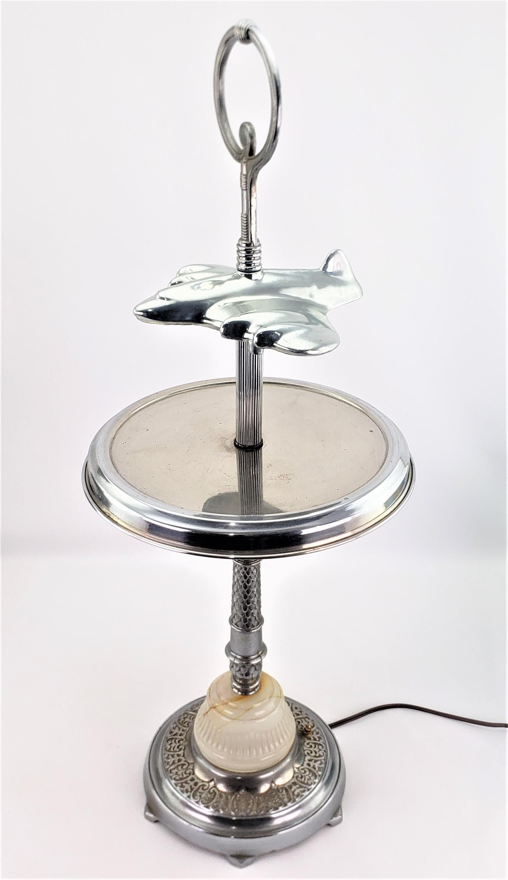 American Unique Art Deco Styled Chrome Jet Airplane Lighted Smoker's Stand or Table For Sale