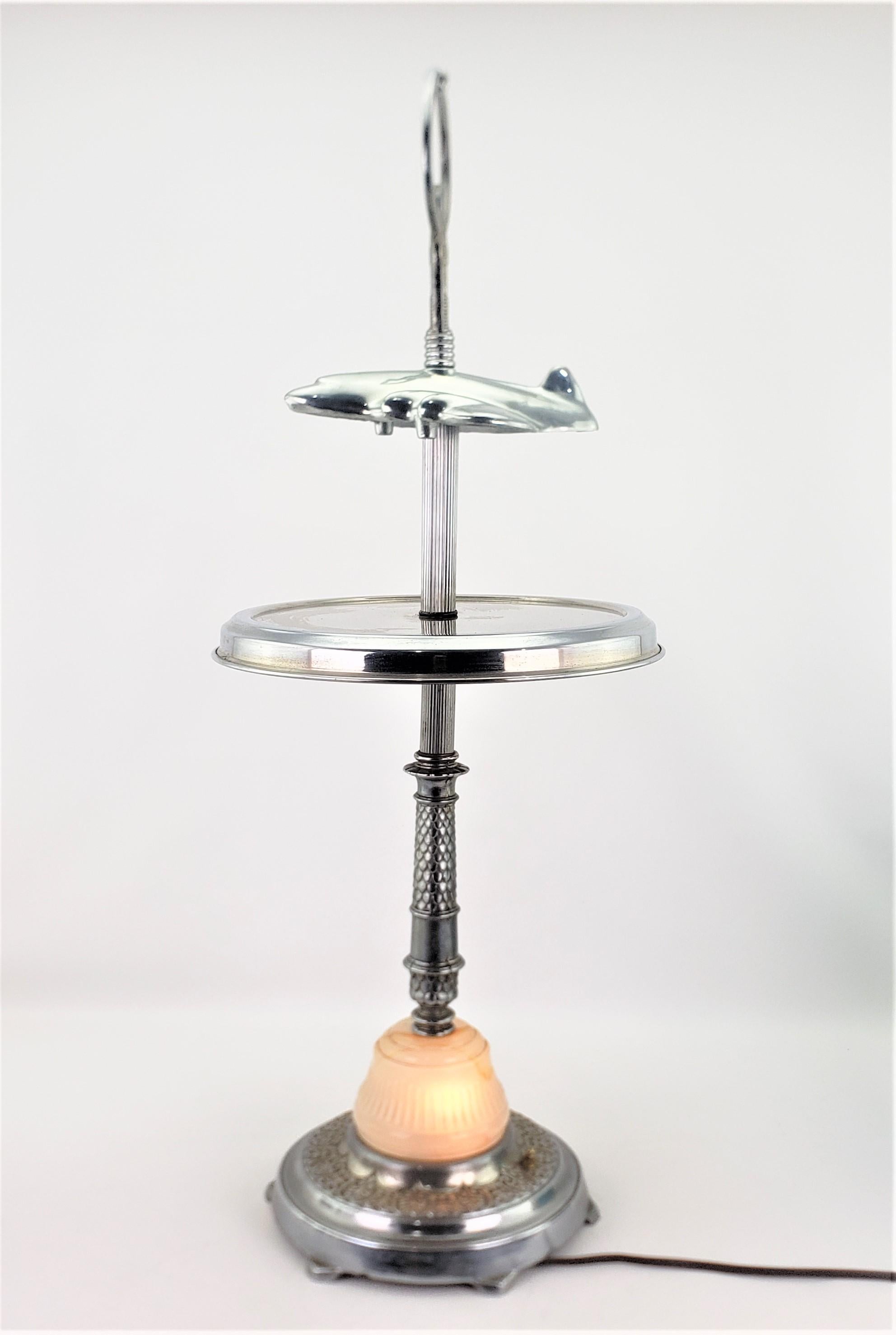 Cast Unique Art Deco Styled Chrome Jet Airplane Lighted Smoker's Stand or Table For Sale