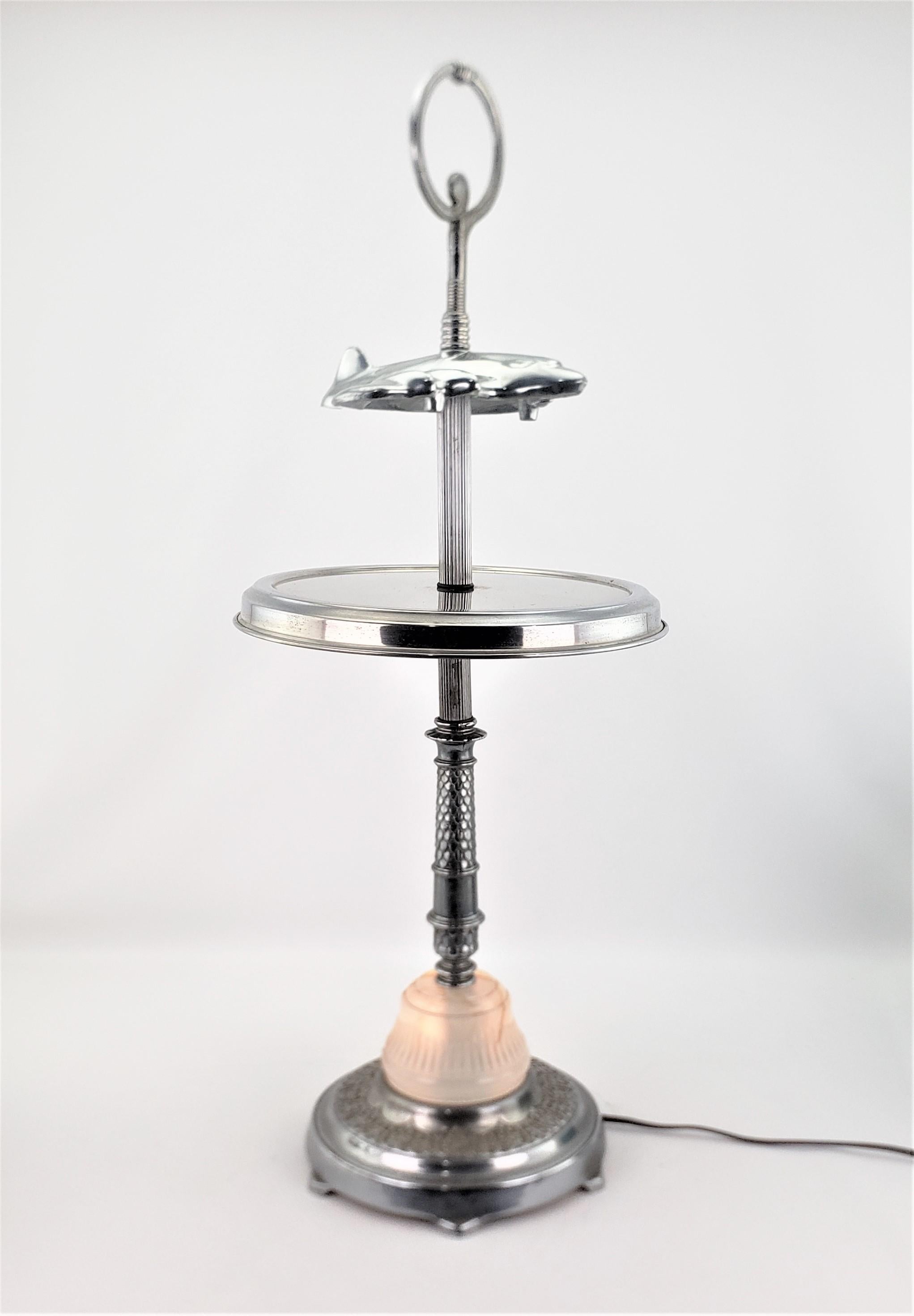 Metal Unique Art Deco Styled Chrome Jet Airplane Lighted Smoker's Stand or Table For Sale