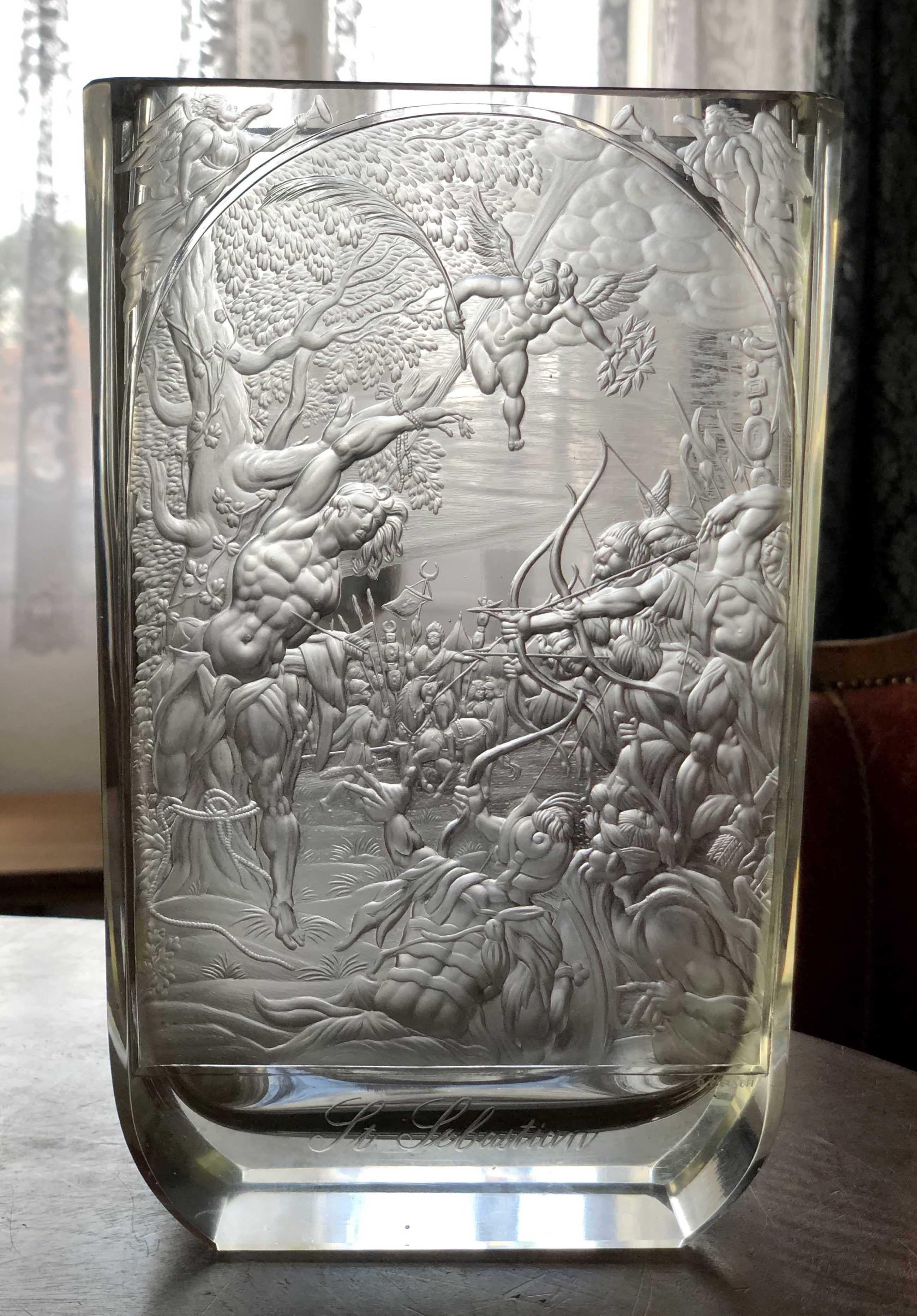 A unique engraved vase from the first half of the 20th century . This breathtaking figural engraving depicting the execution of Saint Sebastian – ( According to legend, Sebastian, the captain of the Praetorian Guard at the imperial court, openly