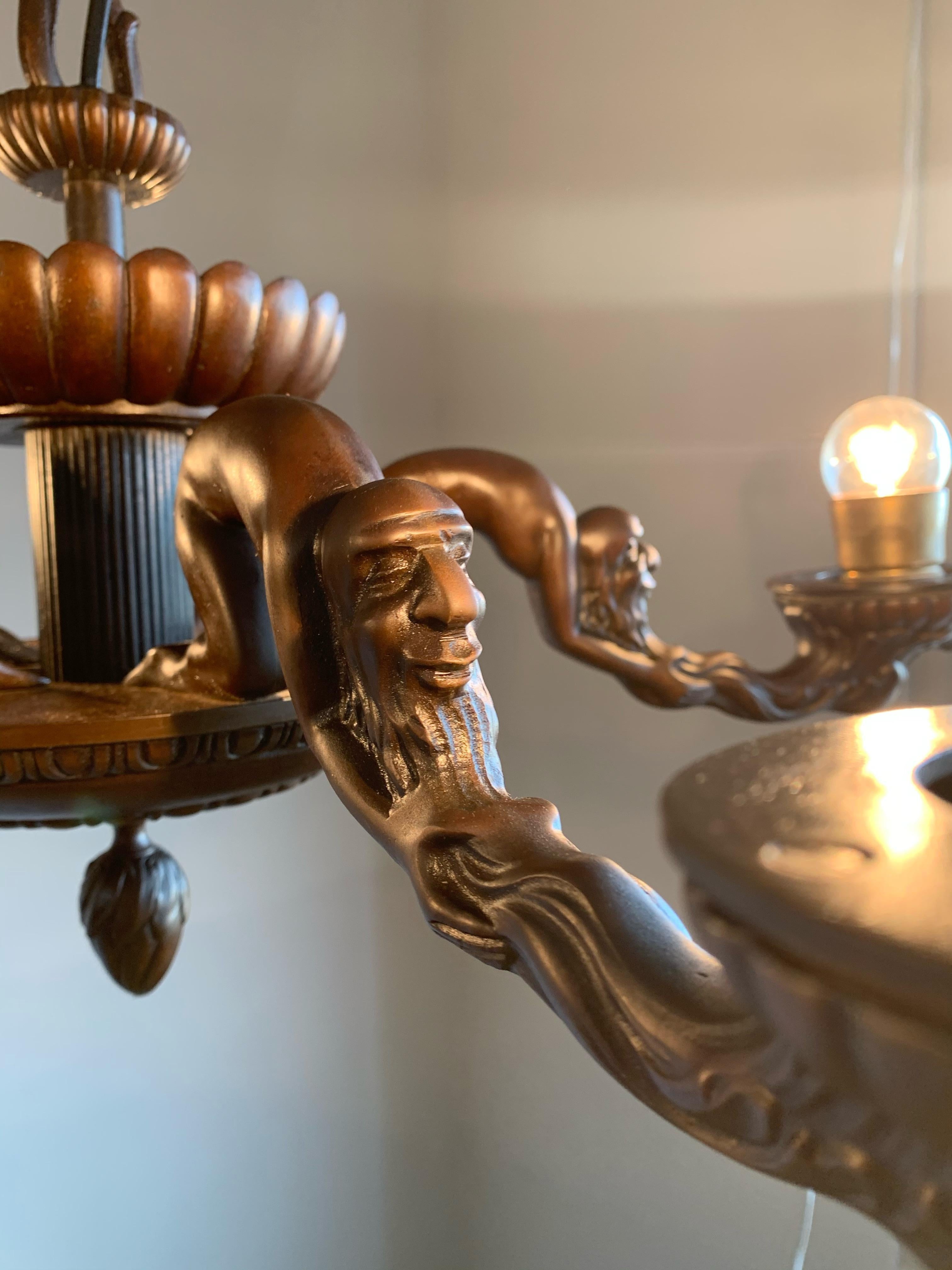 20th Century Unique Art Deco Alabaster and Bronze Chandelier with Wizard Like Sculptures For Sale