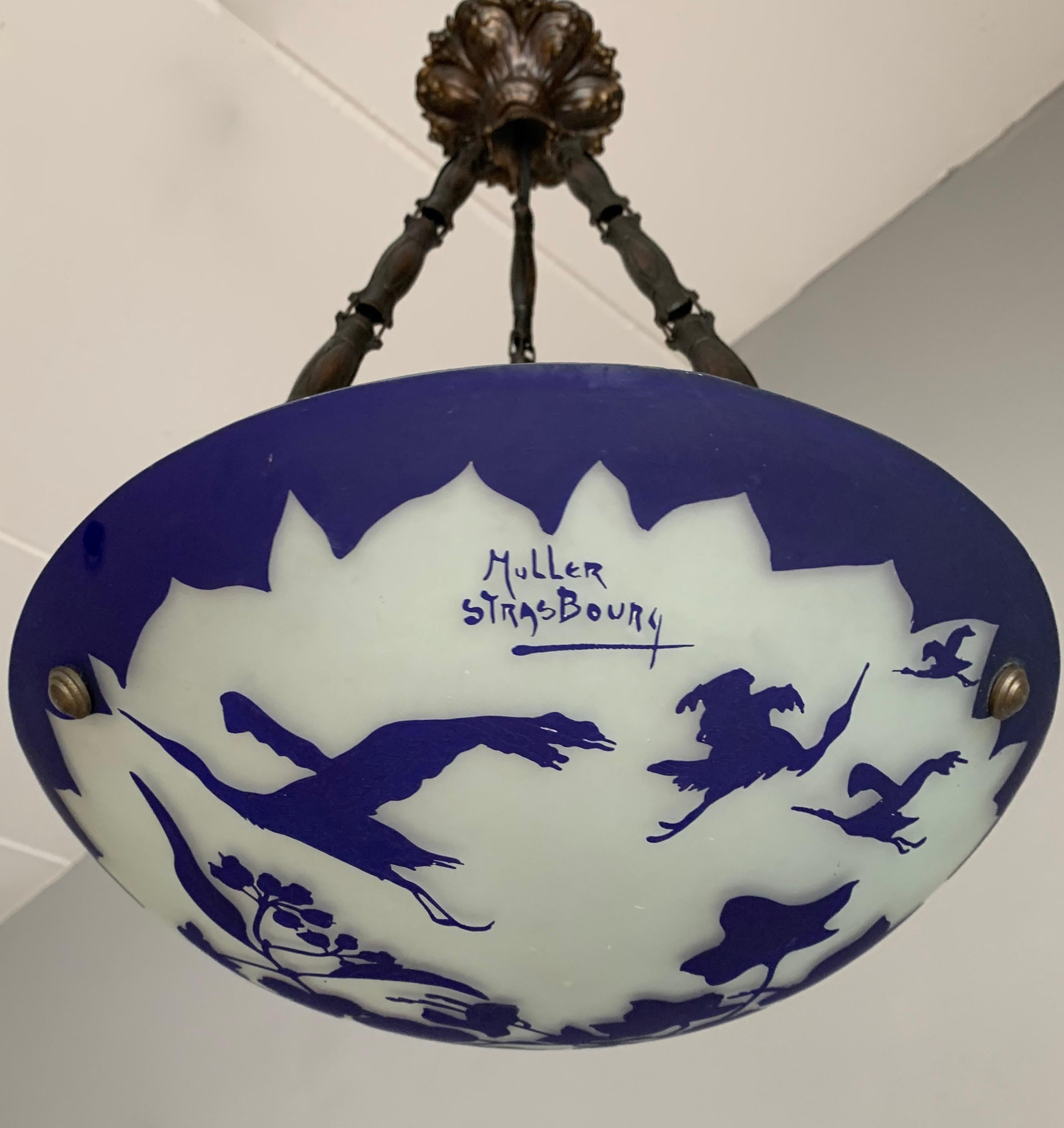 Unique and stunning work of lighting art.

If you are passionate about early 20th century decorative art then you will love this one of a kind, art glass light fixture. What you are seeing here is a possibly unique pendant, signed by 'Muller,