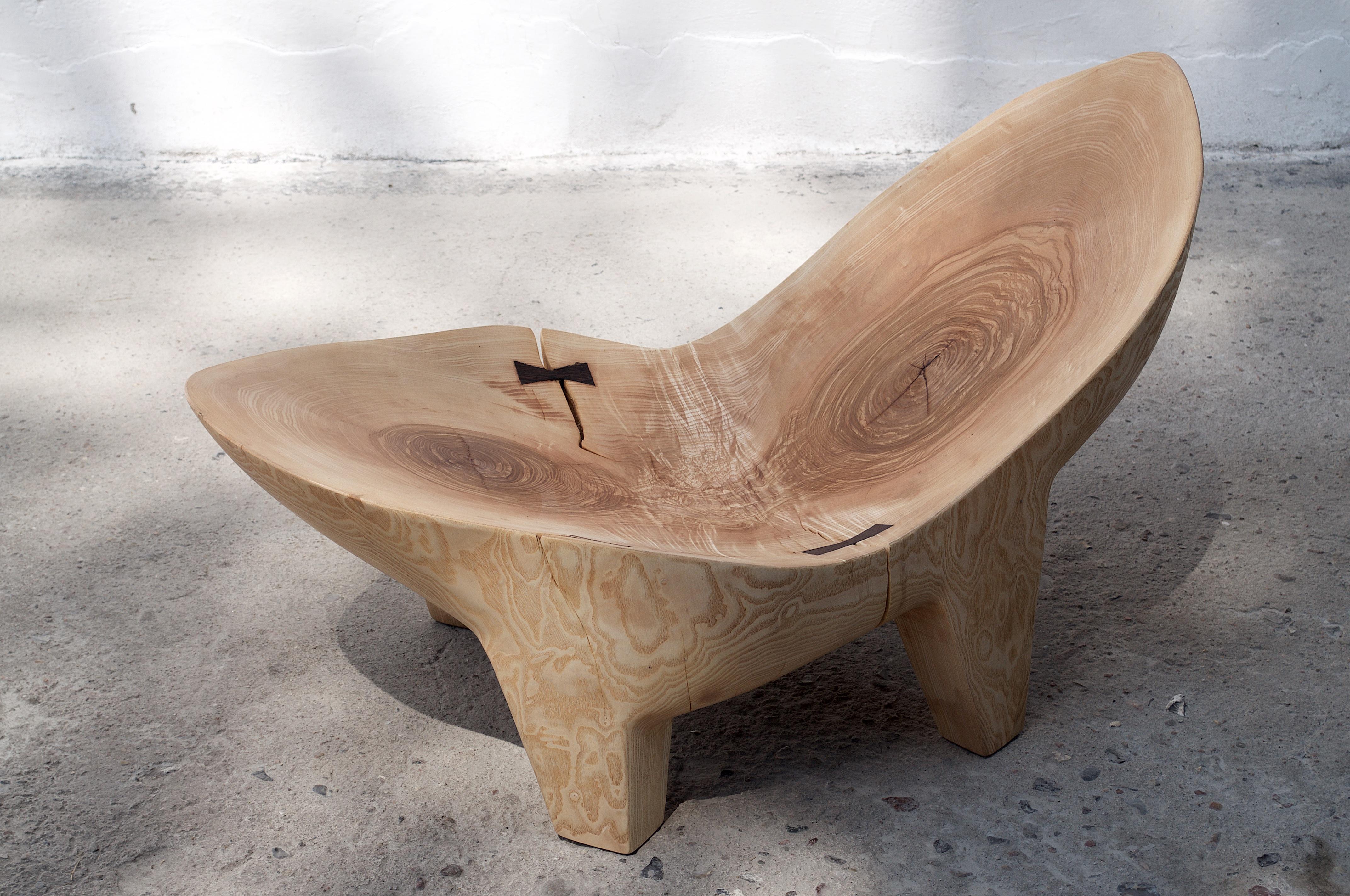 Unique Ash Sculpted Chair by Jörg Pietschmann
Ash
Dimensions: H 58 x W 95 x D 53 cm


Side piece of an old oak with exceptional burl on colorful legs. Polished oil finish.

In Pietschmann’s sculptures, trees that for centuries were part of a