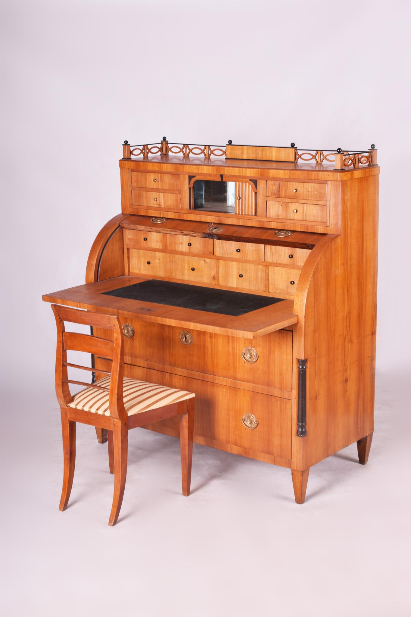 Shipping to any US port only for $290 USD

Empire Secretary/Writing desk - (Cylinder)
Material: cheerywood. 
Completely restored, Shellac polish.
Period: 1810-1819
Source: Austria, Wien.

We guarantee safe a the cheapest air transport from Europe to