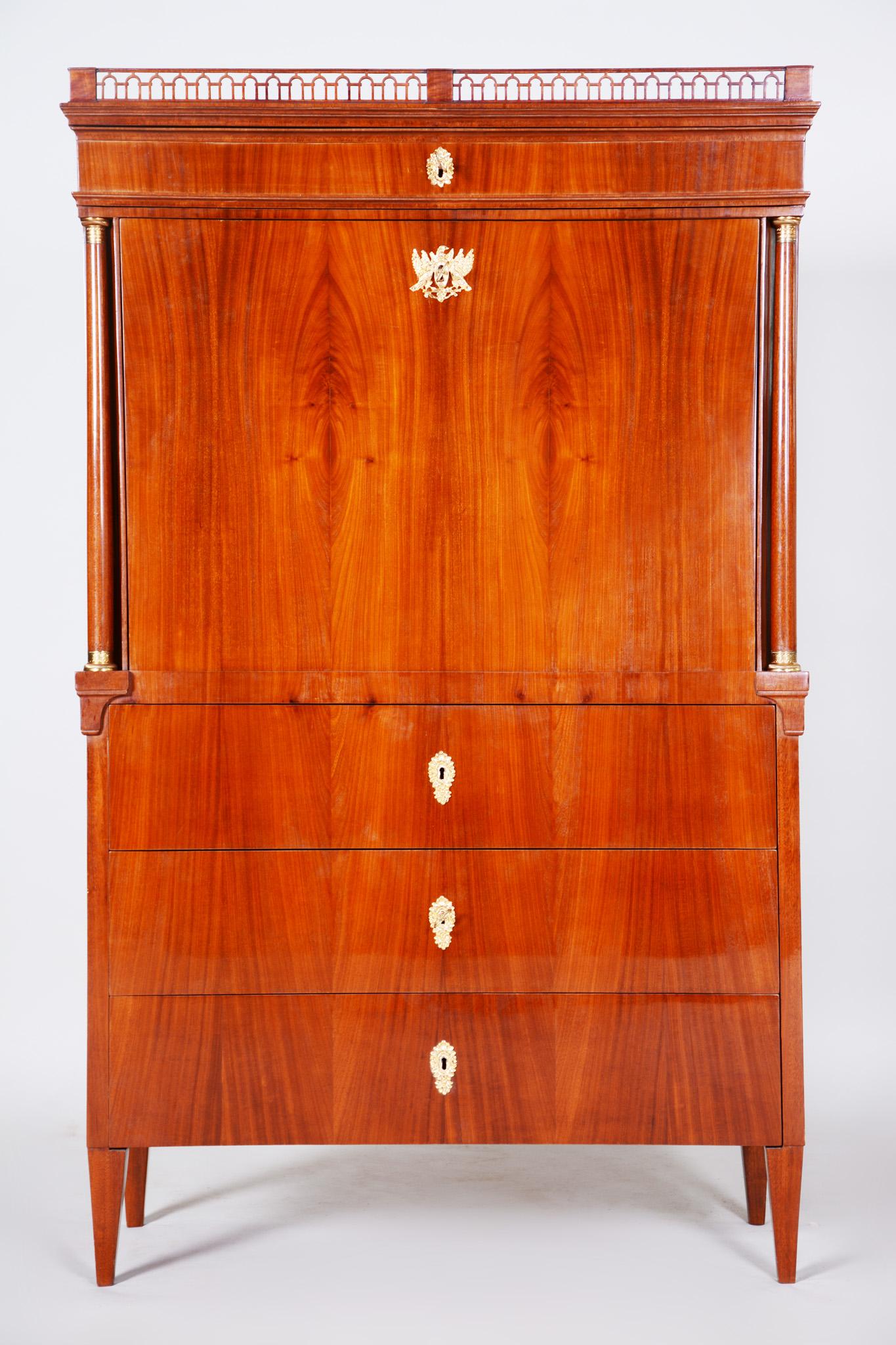 Empire secretary or writing desk, (Cylinder)
Material: Mahogany. 
Completely restored, Shellac polish.
Period: 1820-1829
Source: Austria, Wien.