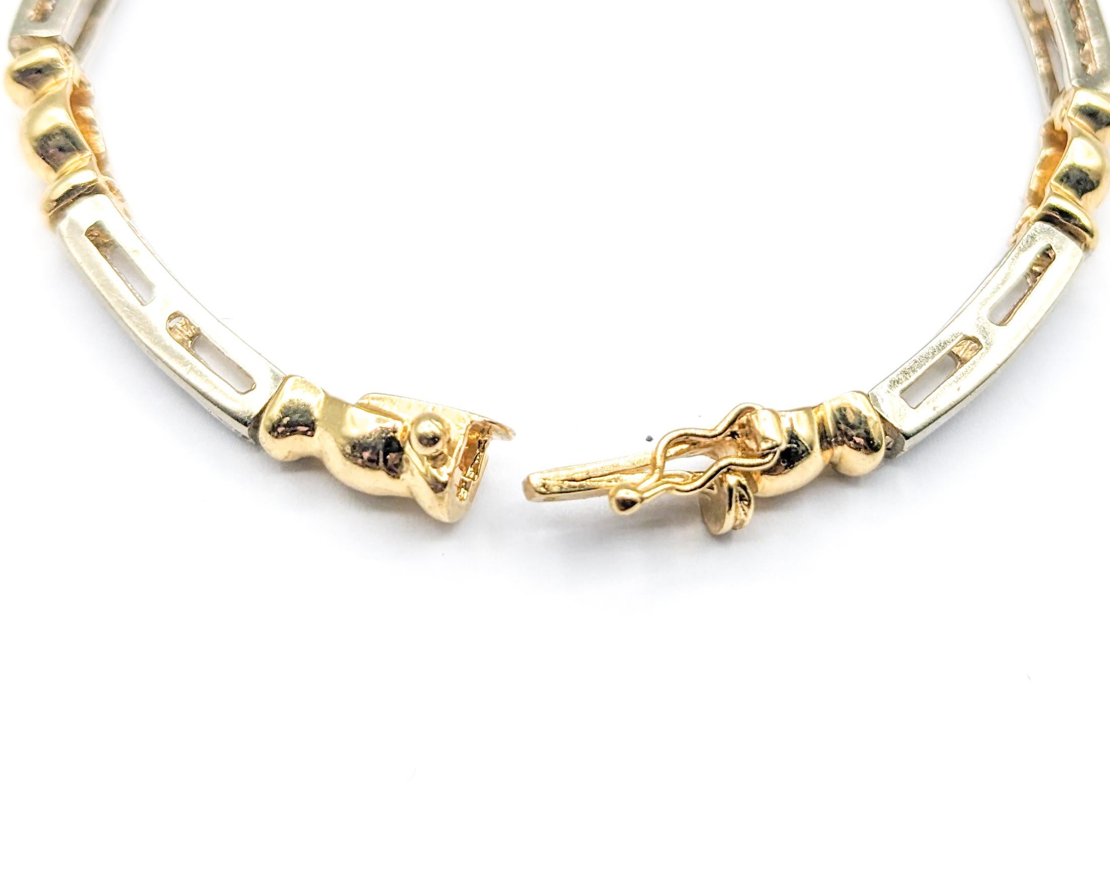 Unique Bar and Ball Design Bracelet In Two-Tone Gold

This stunning bracelet, finely crafted in 14kt two-tone gold, is adorned with 1.0ctw of diamonds that radiate a near colorless white hue with I clarity. The unique bar and ball design adds a
