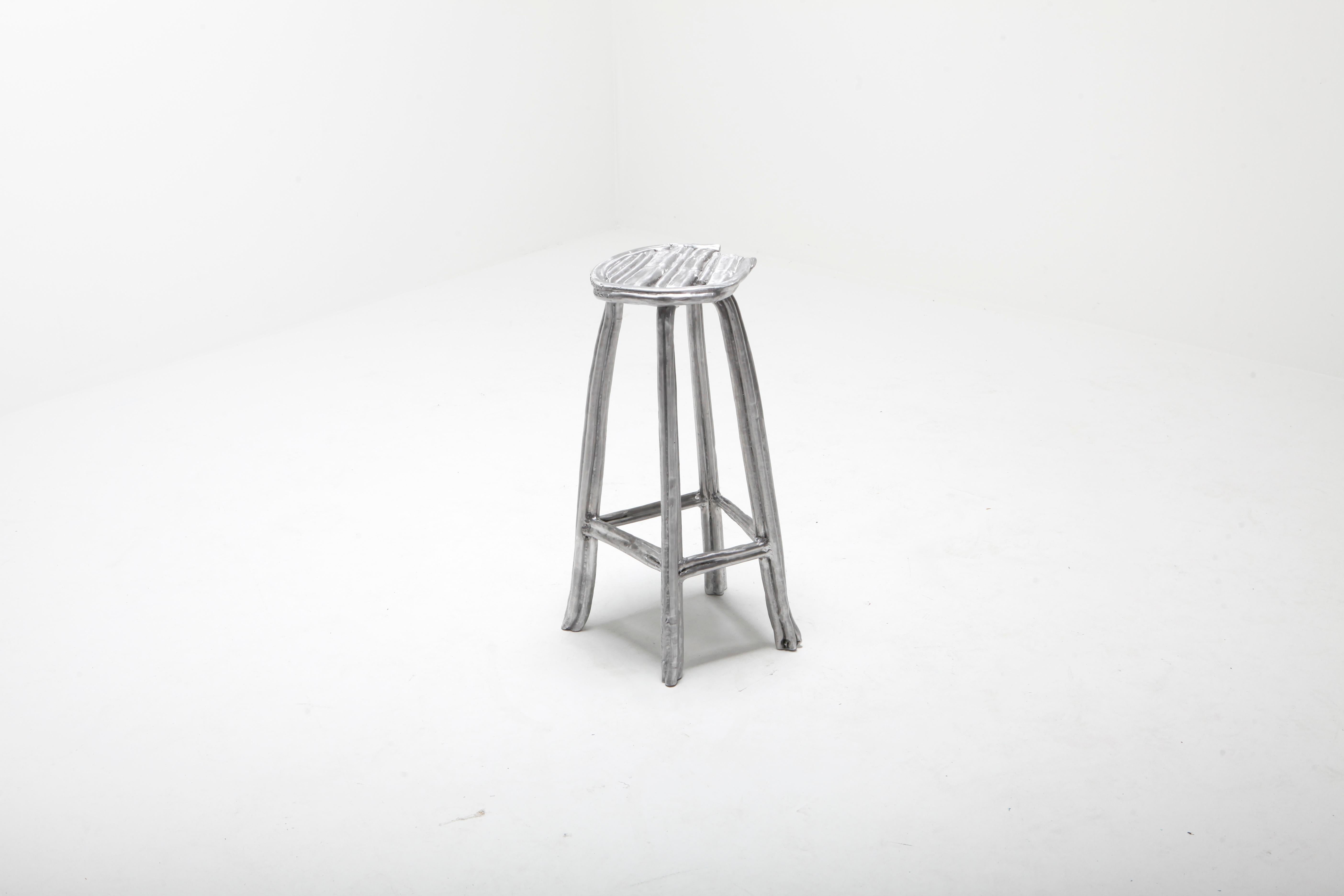 Unique bar stool T-008 -by Studio Nicolas Erauw
Piece unique 1 of 1
Dimensions: H 70 CM x Ø 35 CM
Materials: Aluminum, wax dipped
13 kg

Part of the on-going ‘Wax on/Wax off series’. These series are a collection of experiments of lost-wax