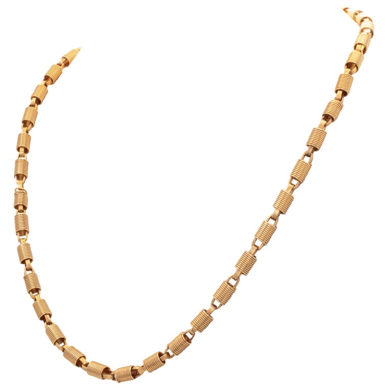Unique Barrel coil necklace in 14k yellow gold. Length 18" For Sale at