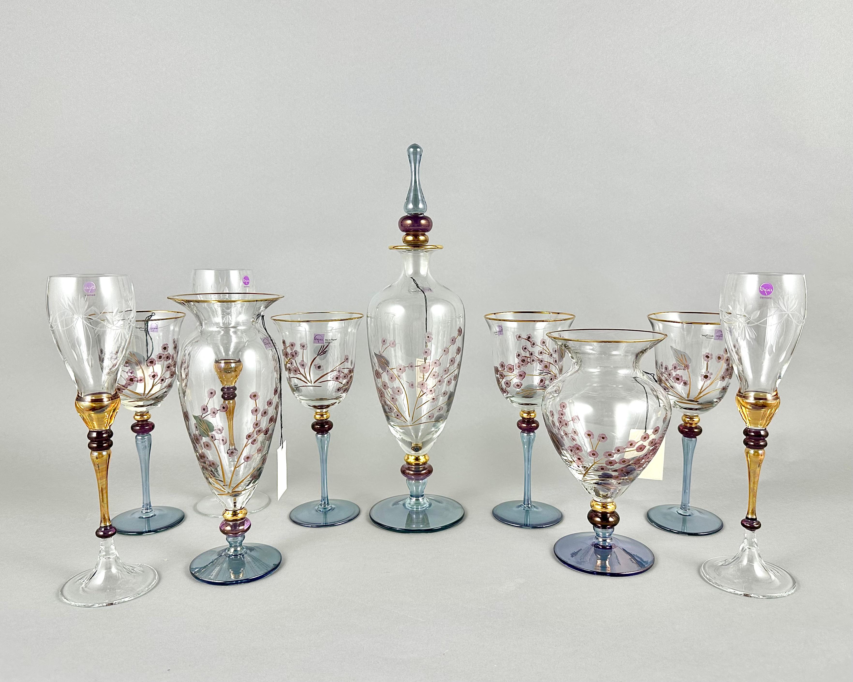Unique Barware Set of Vintage Wine Champagne Glasses Vases and Decanter Designed by Paul Nagel, Germany, circa 1980s.

Colourless clear glass with hand-painted floral motifs. Gold-plated edge.

Rare vintage barware set from Nagel, a long-established
