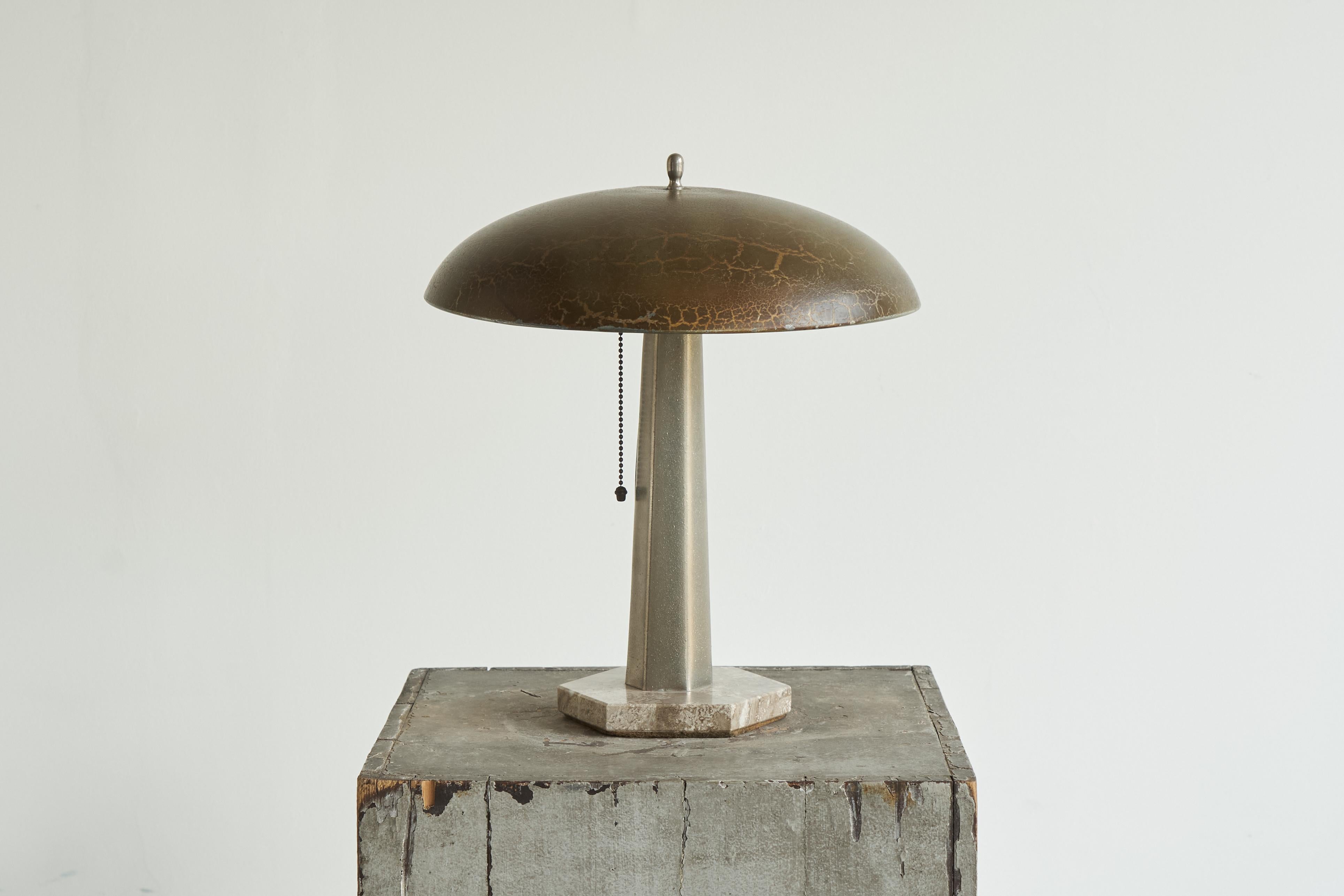 Unique Bauhaus Table Lamp in Metal and Marble, Europe, 1930s.

This lamp is a true gem for lovers of a wonderful patina. Highly unusual and most probably built at home by a skilled craftsman - it definitely is not a lamp that was produced in a