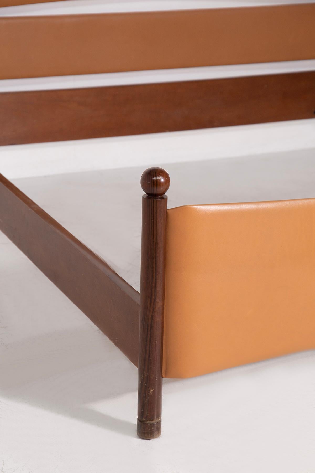 Immerse yourself in the refined elegance of the 1970s with this distinguished European double bed, a creation of the renowned designers Osvaldo Borsani and Eugenio Gerli. Sourced from a private collection in Milan, this bed epitomizes the luxurious