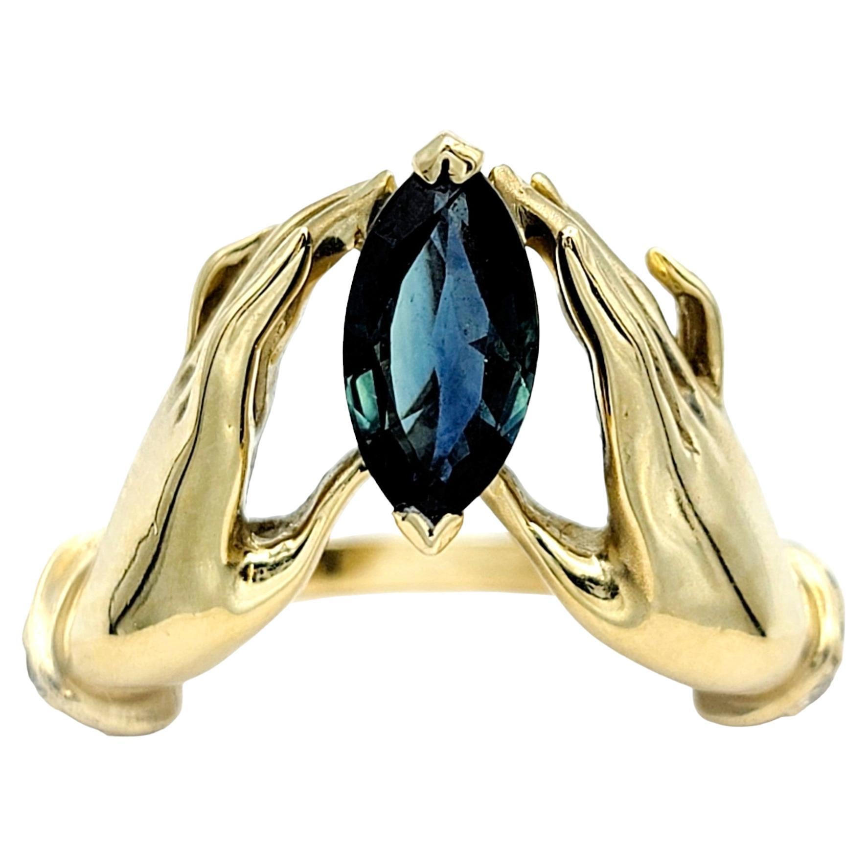 Unique Bejeweled Graceful Hands Holding Marquis Sapphire 14K Yellow Gold Ring For Sale