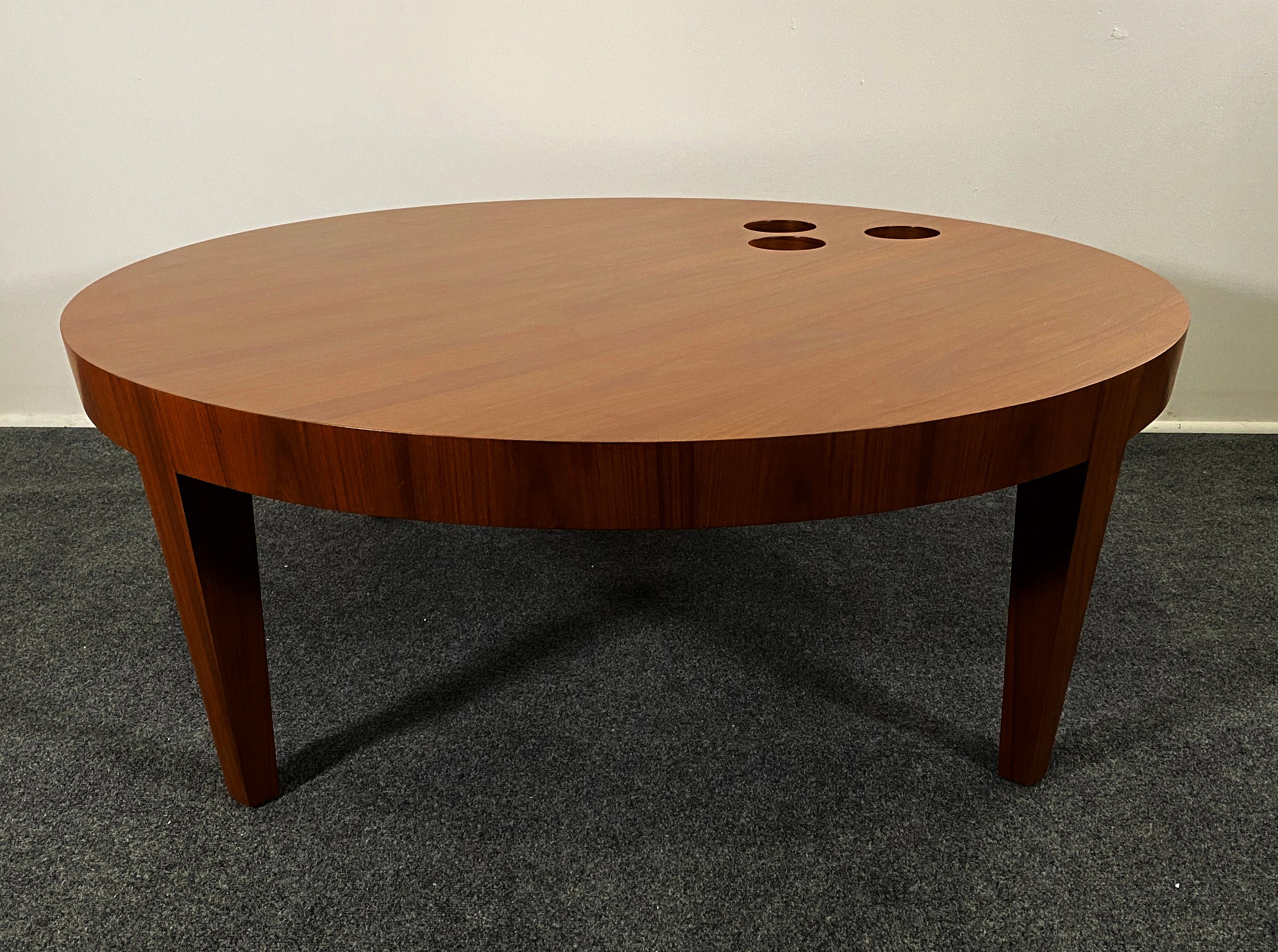 Colombian Artist designed bespoke furniture, unique walnut round coffee table with round cutouts, Antonio Fortuna.