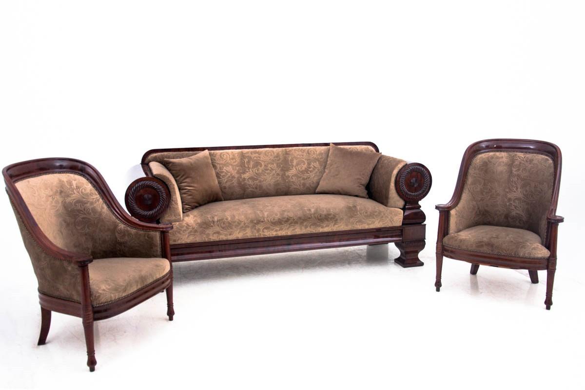 Unique Biedermeier salon set consisting of sofa and two armchairs. This furniture were made in Sweden circa 1850s. In our shop it went through the process of professional restoration. 
The set is in very good condition, after renovation of the wood