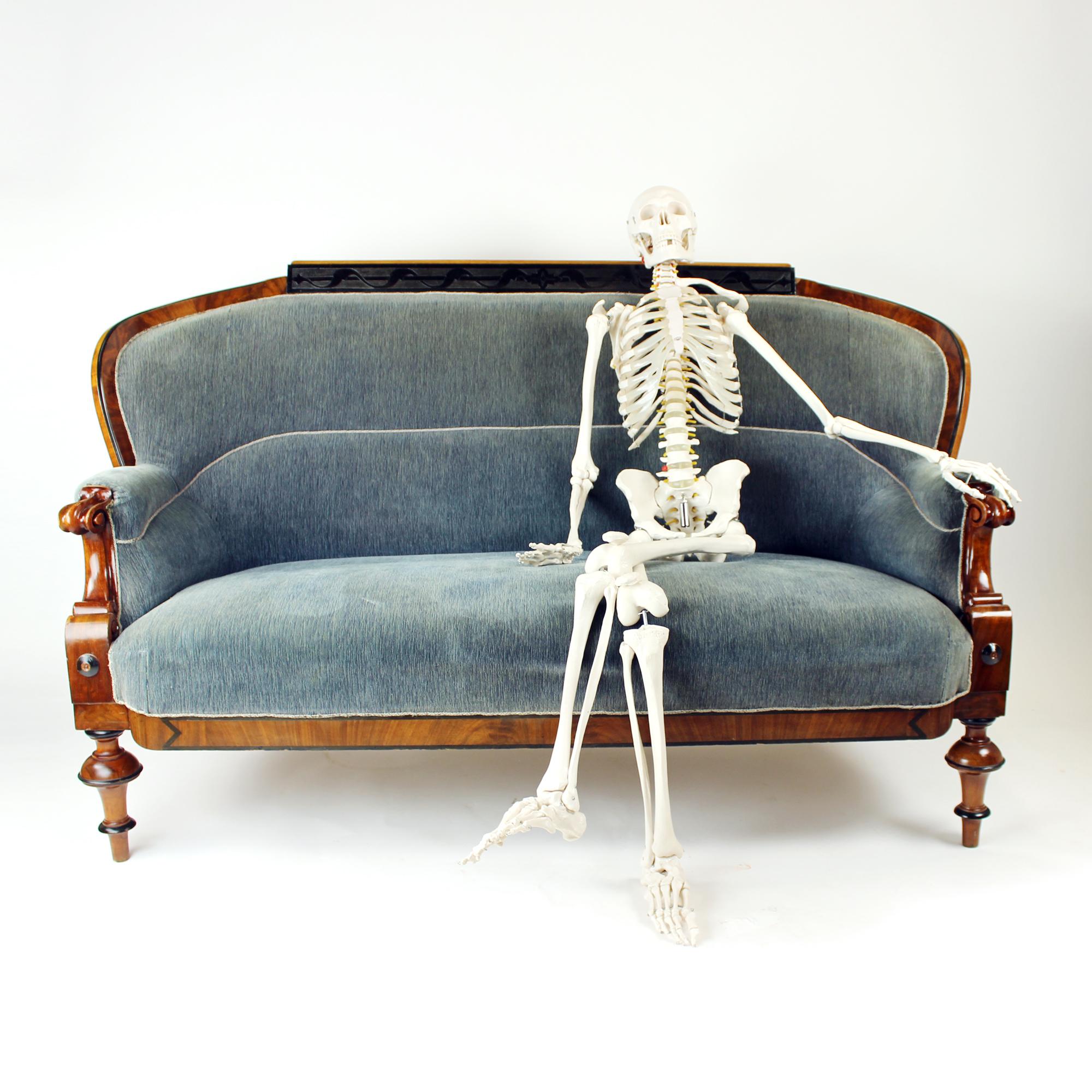 An outstanding example of early 19th-century craftsmanship, this original Biedermeier sofa was produced in Vienna, Austria in 1825. Elegantly proportioned and richly detailed, the piece embodies the refined simplicity and understated luxury of the
