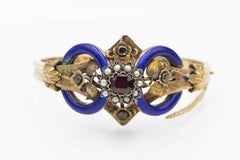 Unique Biedermeier-style gold bracelet with garnet, pearls, and enamel.
