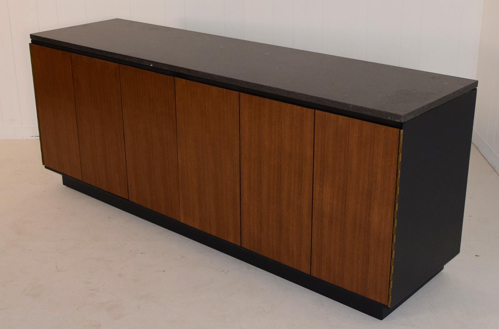 This item is on sale and includes subsidized national shipping within the continental United States.
Paul McCobb, Calvin, Irwin collection, Custom.
USA, circa 1950
Mahogany, walnut, lacquer, granite,
Measure: 71 wide x 19 deep and 28 inches