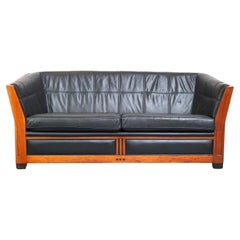 Unique black leather and wooden Art Deco design 2.5-seater sofa