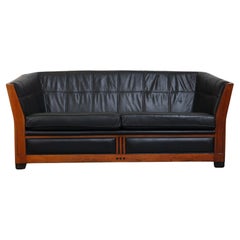 Canapé 2,5 places unique en cuir noir et bois de style Art déco avec une superbe 