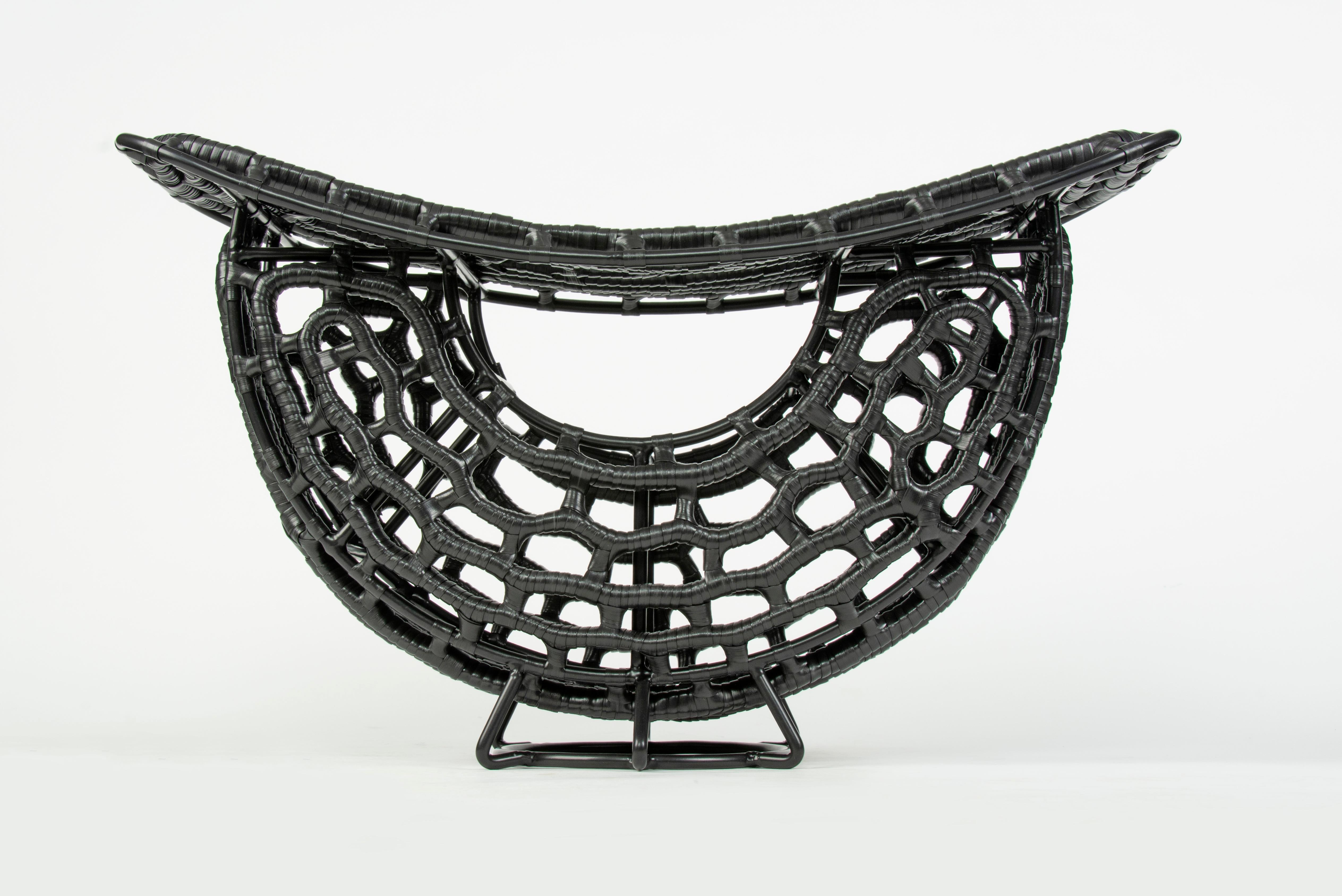 Unique Black Mamba stool by Nawaaz Saldulker
Edition 1/1
2020
Materials: Plastic extruded strips handwoven on a mild steel frame
Dimensions: 60 x 30 x H 35 cm.



 